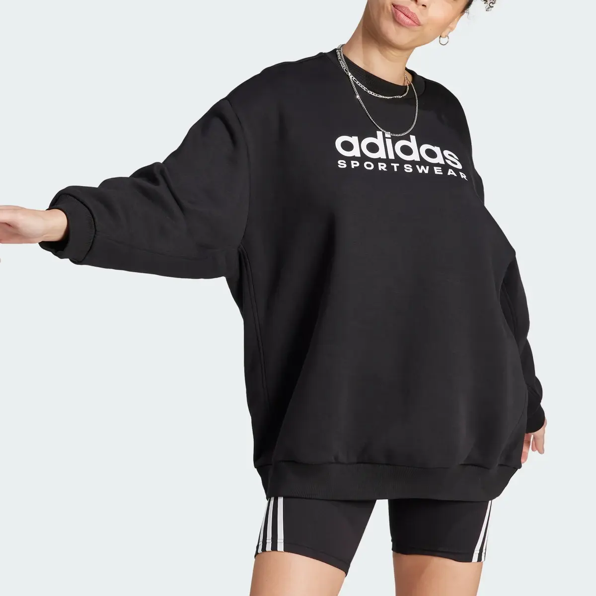 Adidas ALL SZN Fleece Graphic Sweatshirt. 1