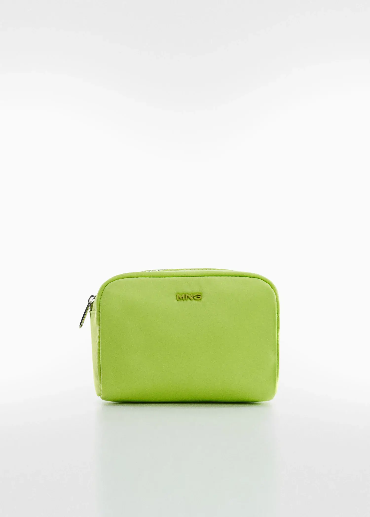 Mango Zippered toiletry bag with logo. a lime green purse sitting on top of a white table. 