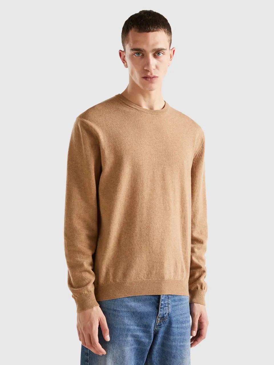 Benetton beige crew neck sweater in pure merino wool. 1