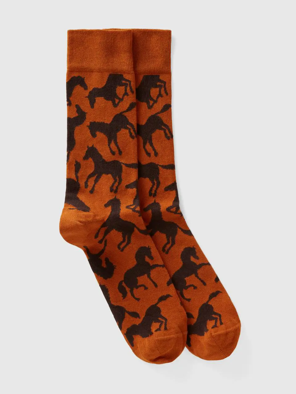 Benetton long camel socks with horses. 1