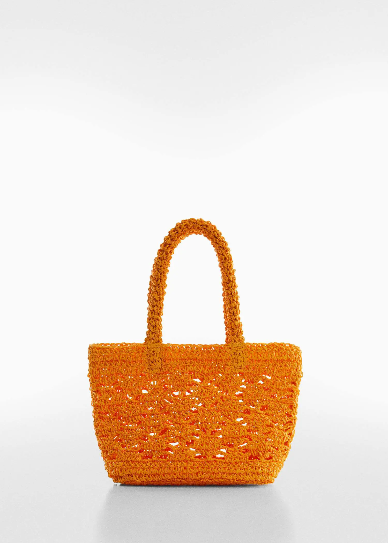 Mango Double-handle raffia bag. an orange crocheted bag with handles on a white background 