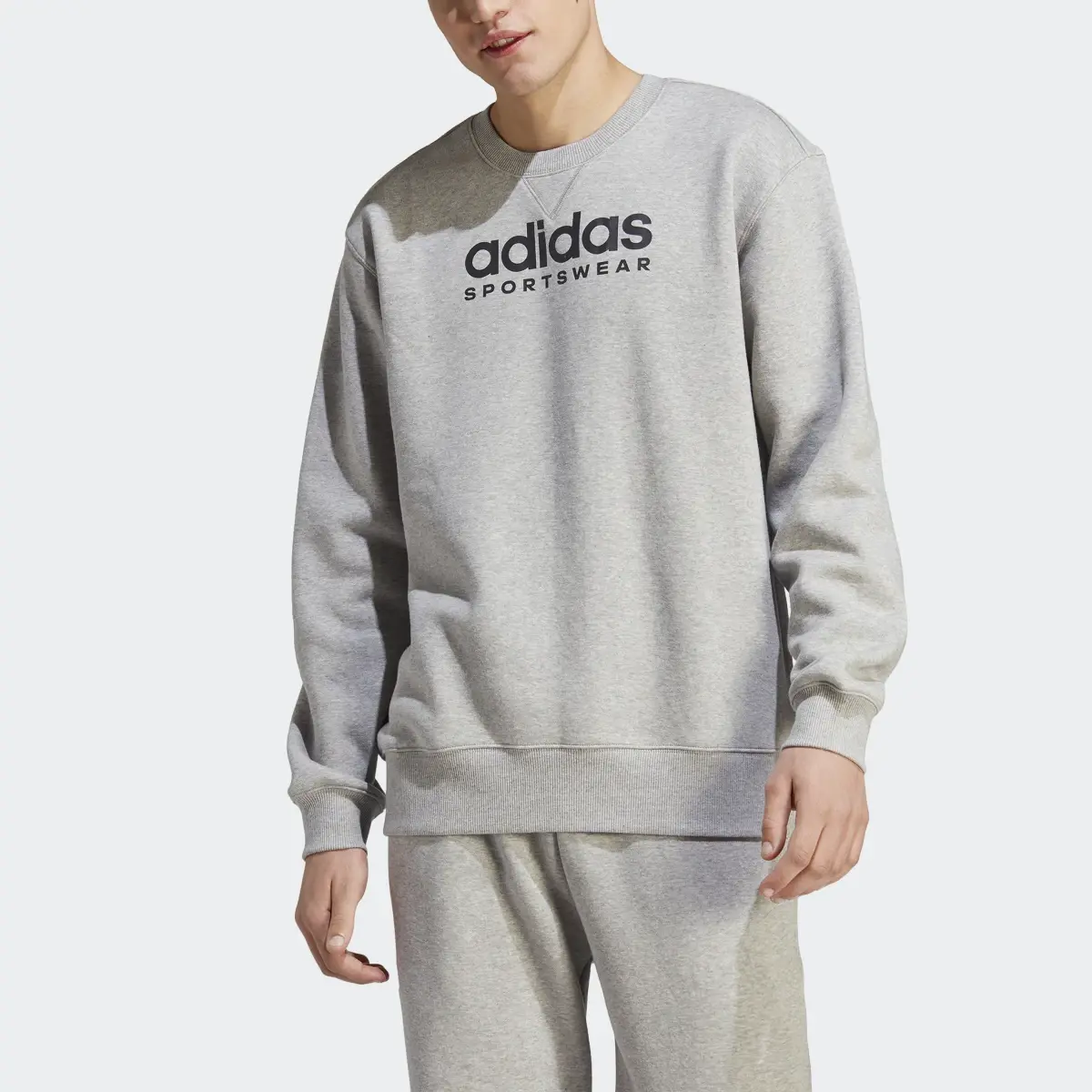 Adidas All SZN Fleece Graphic Sweatshirt. 1