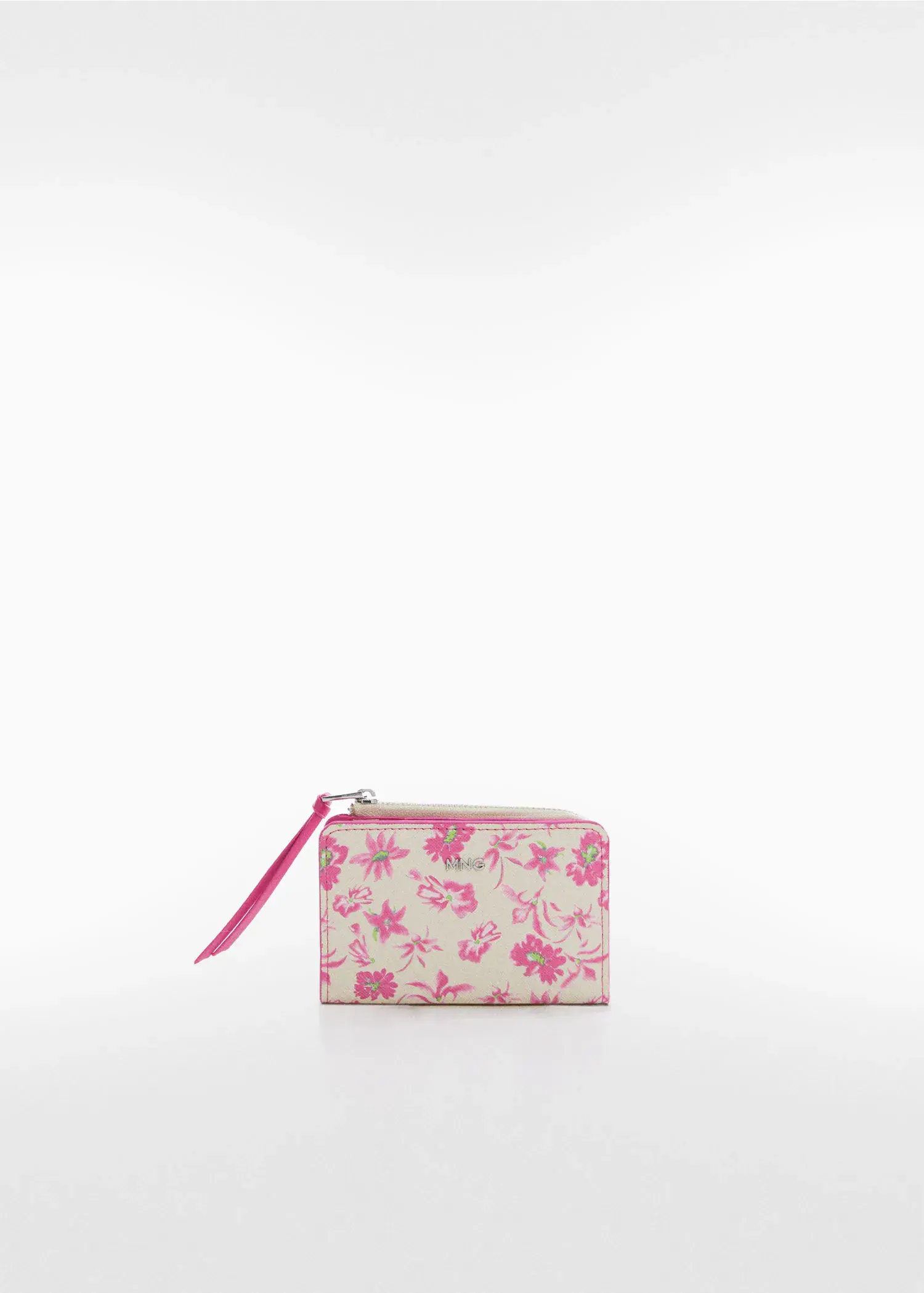 Mango Small floral sapphiano wallet. a pink and white purse sitting on top of a white table. 