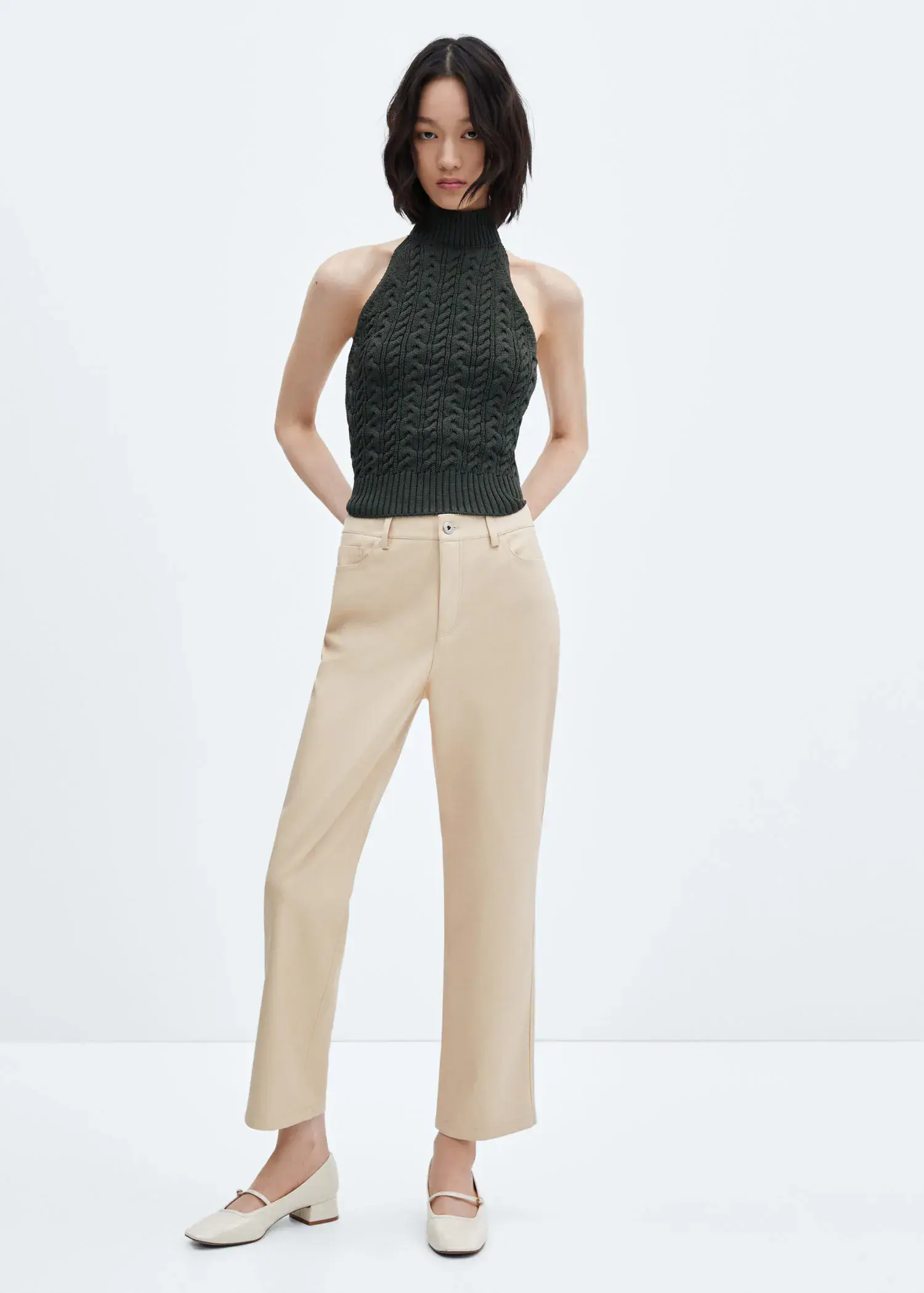 Mango Leather-effect straight trousers. 1