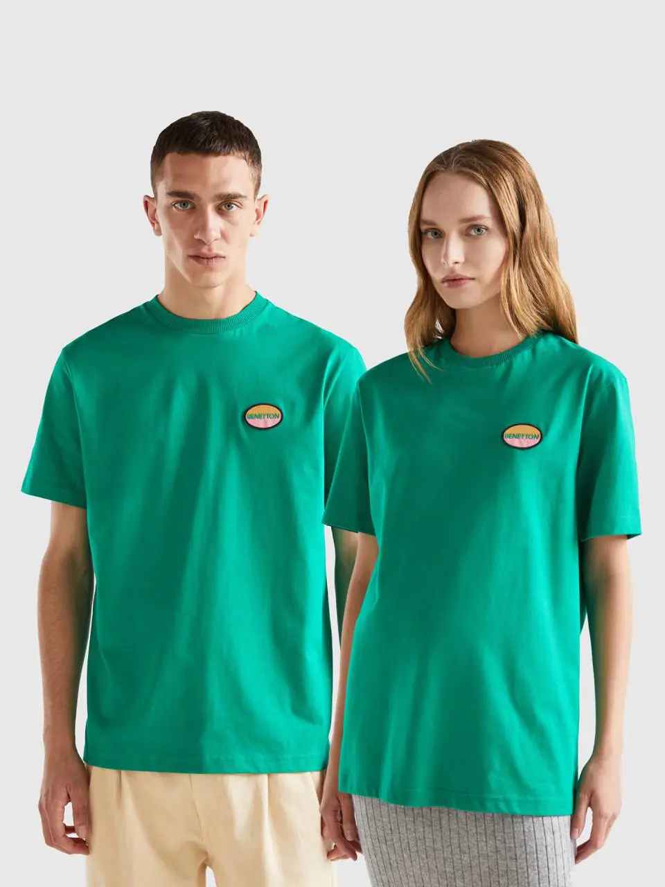 Benetton green t-shirt with patch. 1