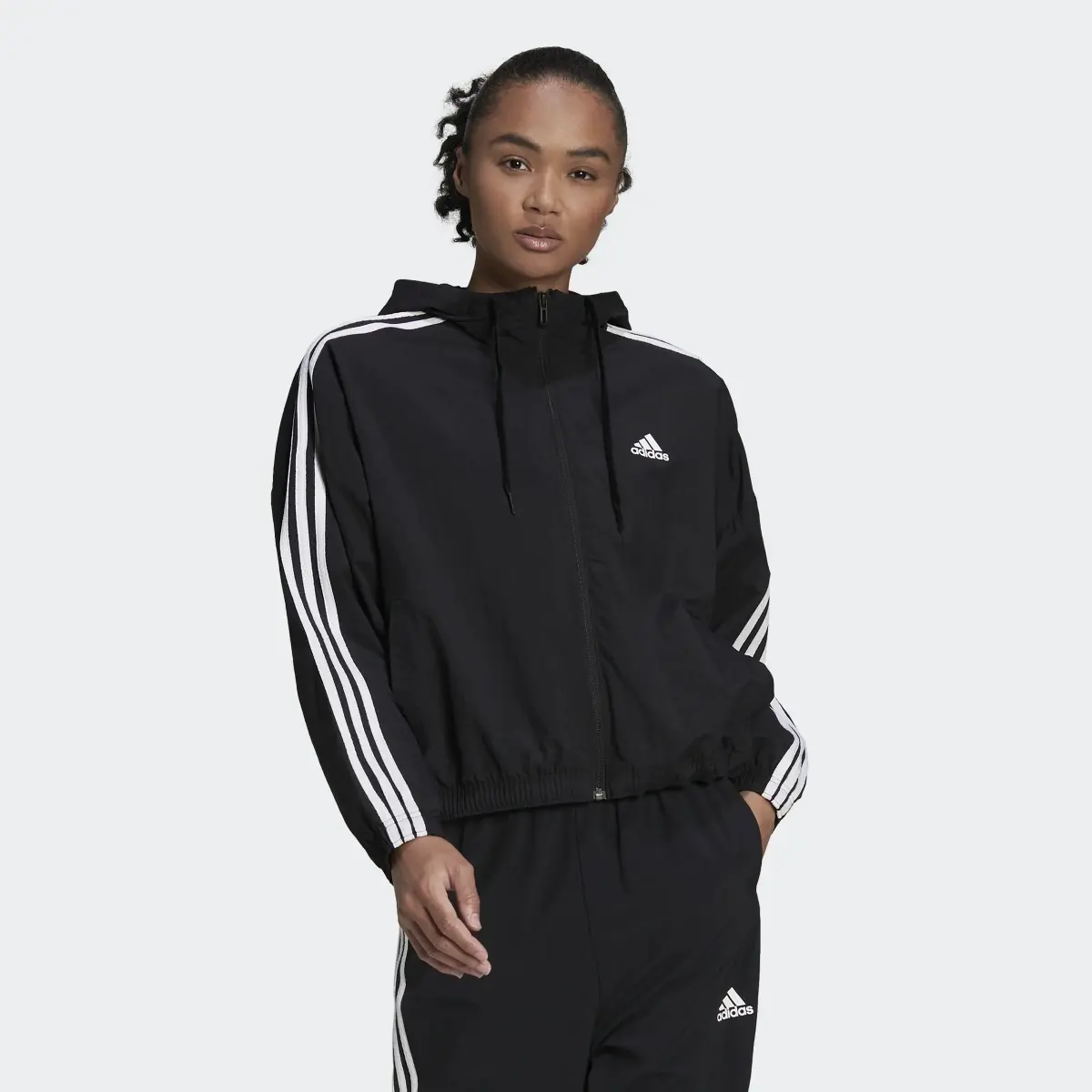 Adidas Essentials Repeat Logo Loose-Fit Windbreaker. 2