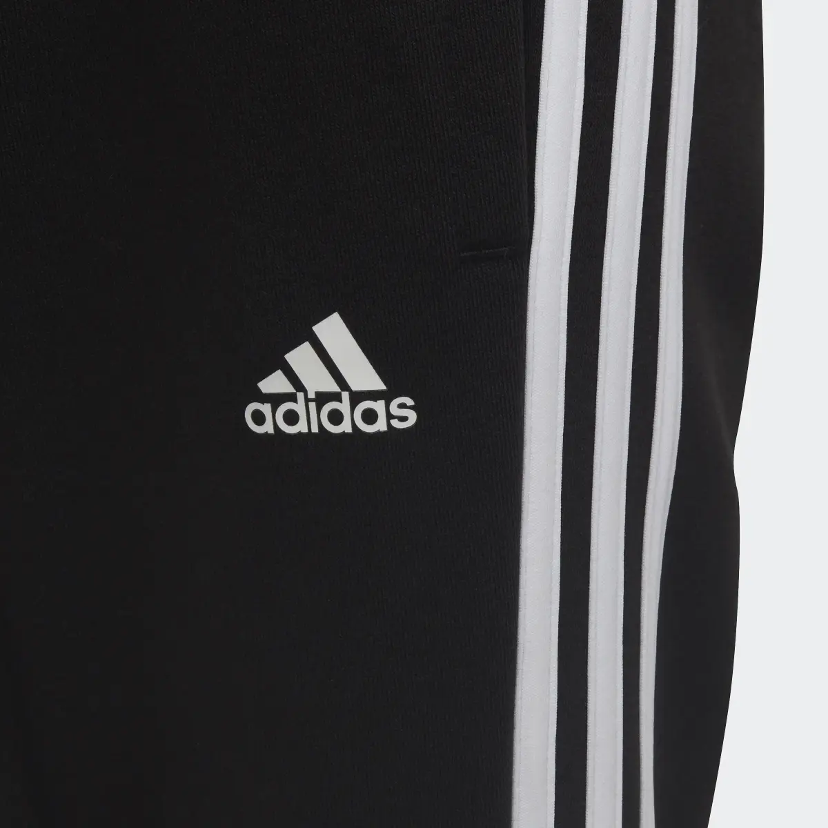 Adidas Essential 3-Streifen Hose. 3