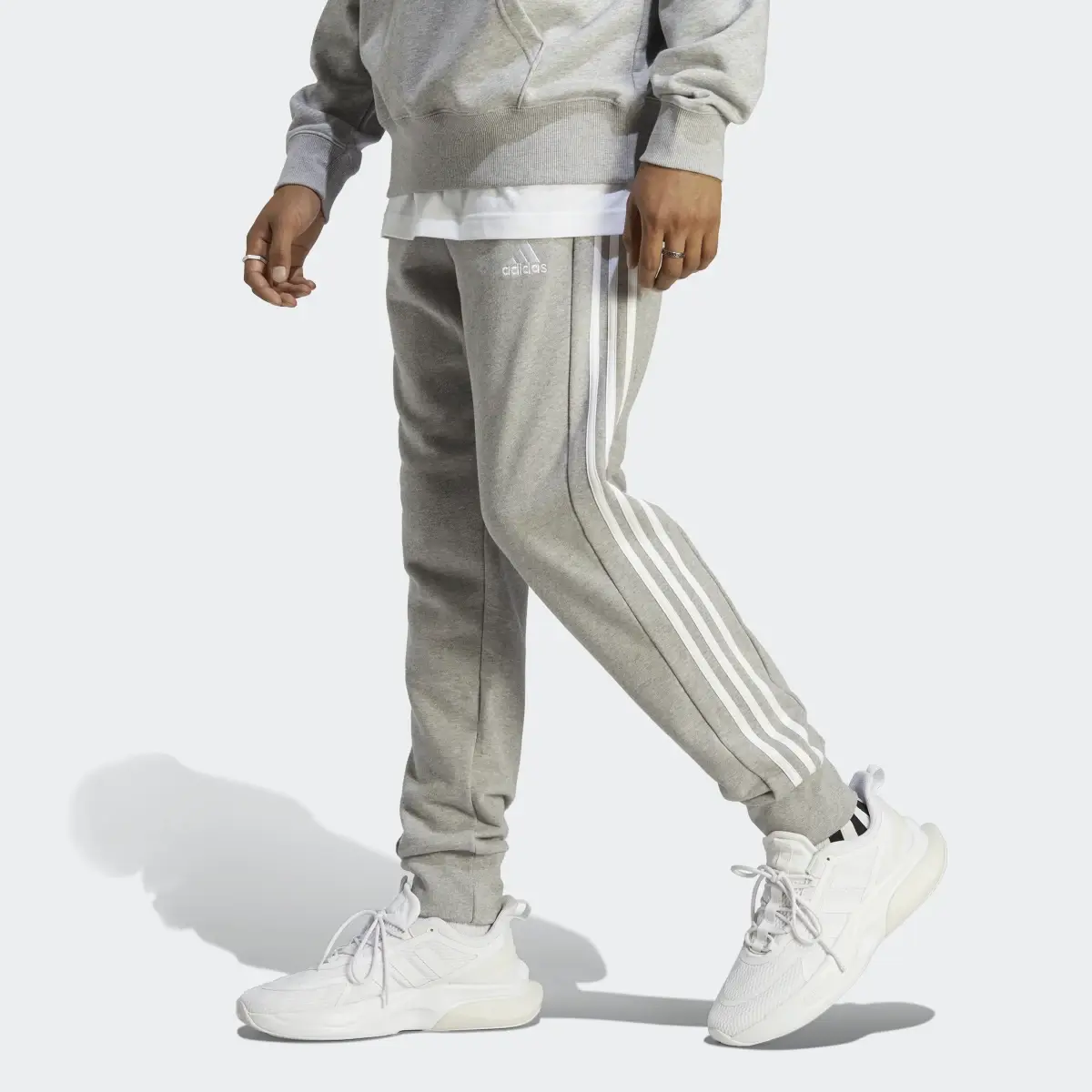 Adidas Essentials French Terry Tapered Cuff 3-Stripes Pants. 1