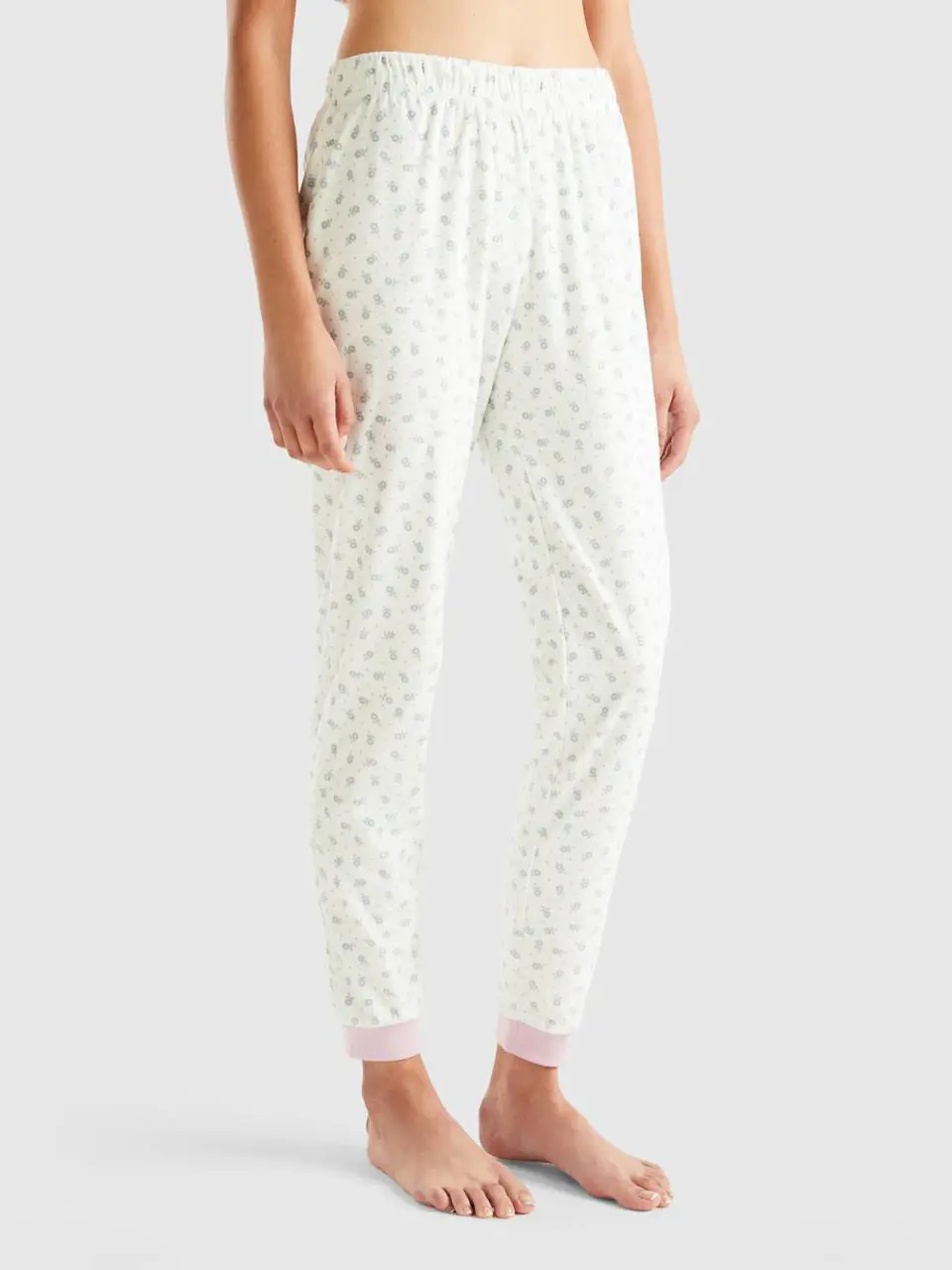 Benetton slim fit floral trousers. 1