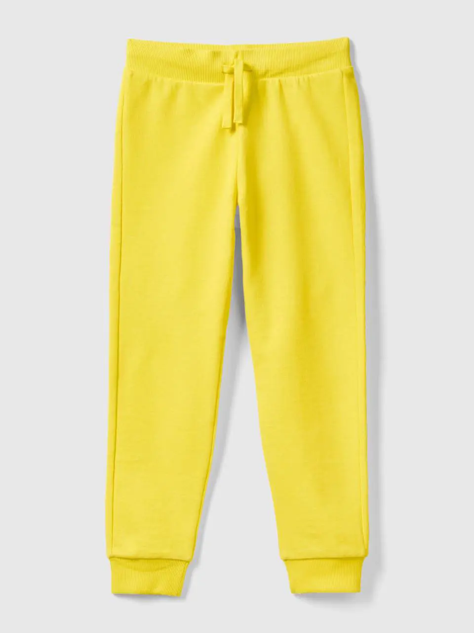 Benetton sporty trousers with drawstring. 1