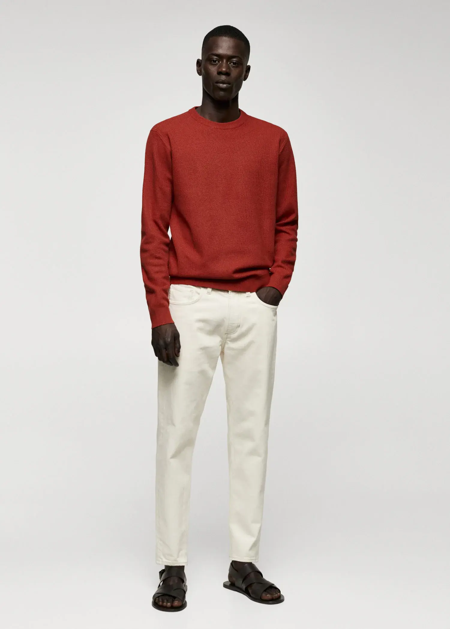 Mango Structured cotton sweater. a man in a red sweater and white pants. 