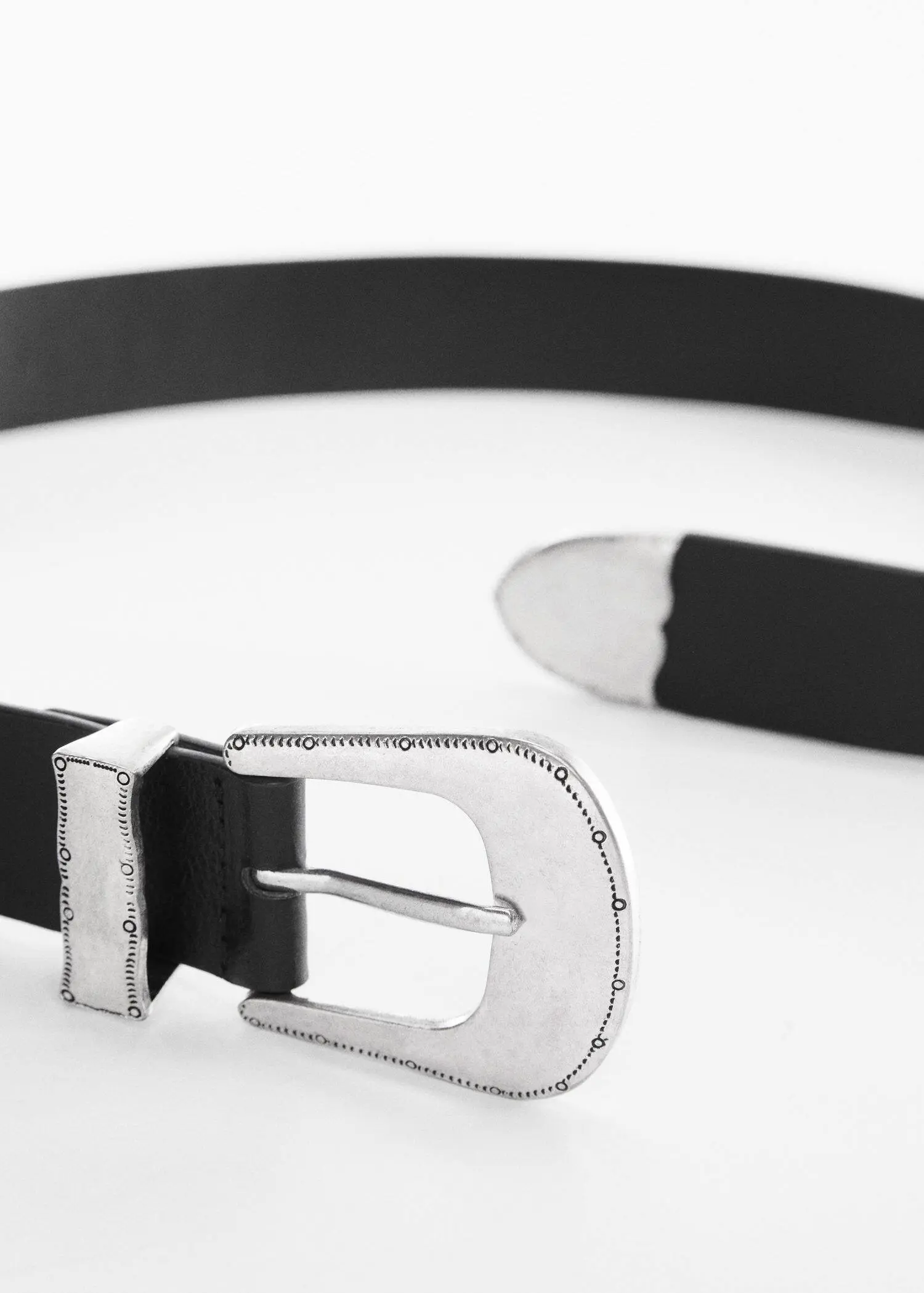 Mango Engraved buckle belt. a close-up of a black belt with a silver buckle. 