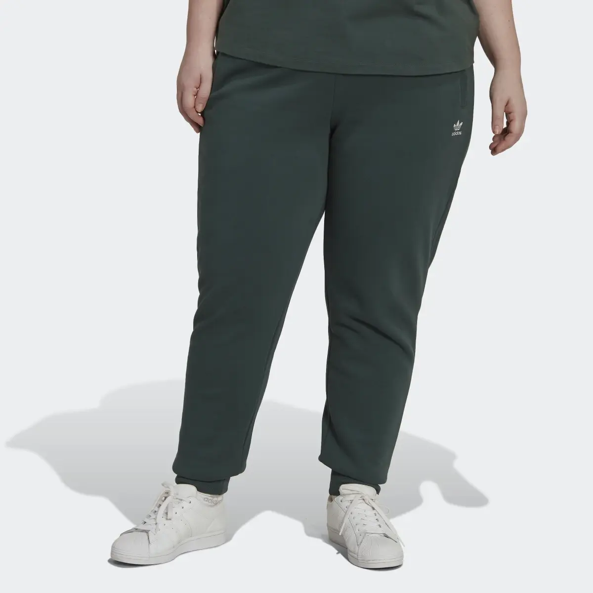 Adidas Adicolor Essentials Fleece Slim Joggers (Plus Size). 1