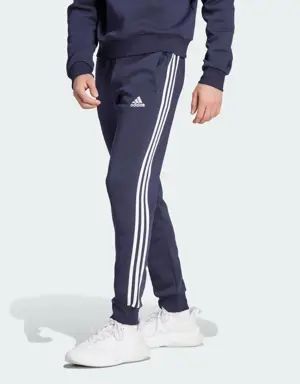 Adidas Calças Afuniladas em Fleece 3-Stripes Essentials