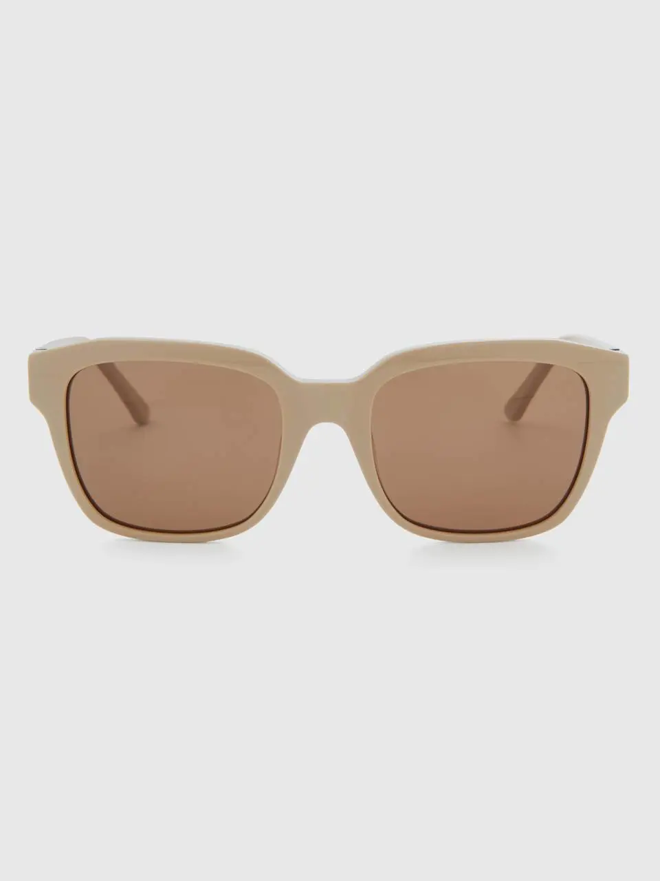 Benetton beige sunglasses with logo. 1
