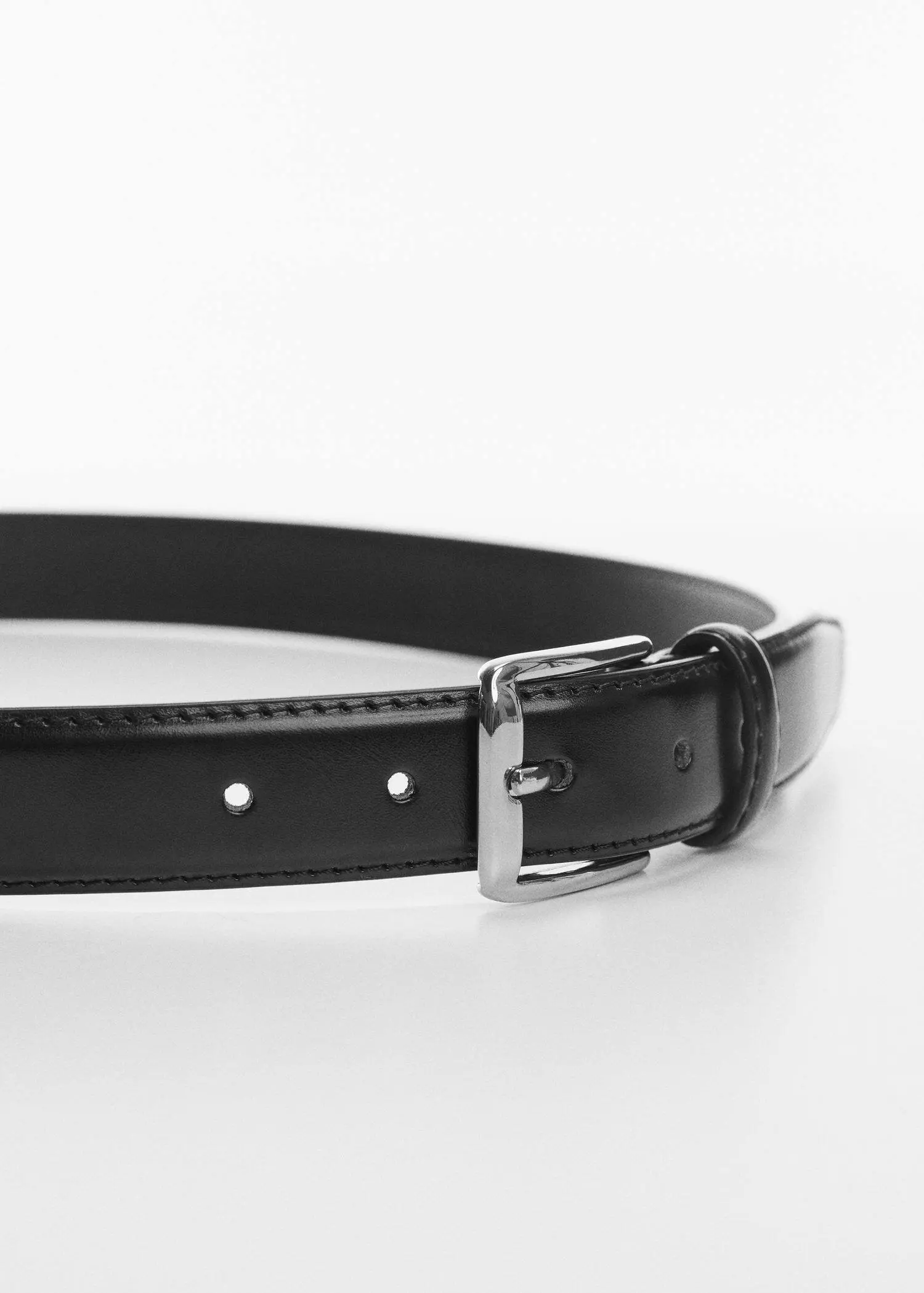 Mango Leather belt. a close-up of a black leather belt with a silver buckle. 