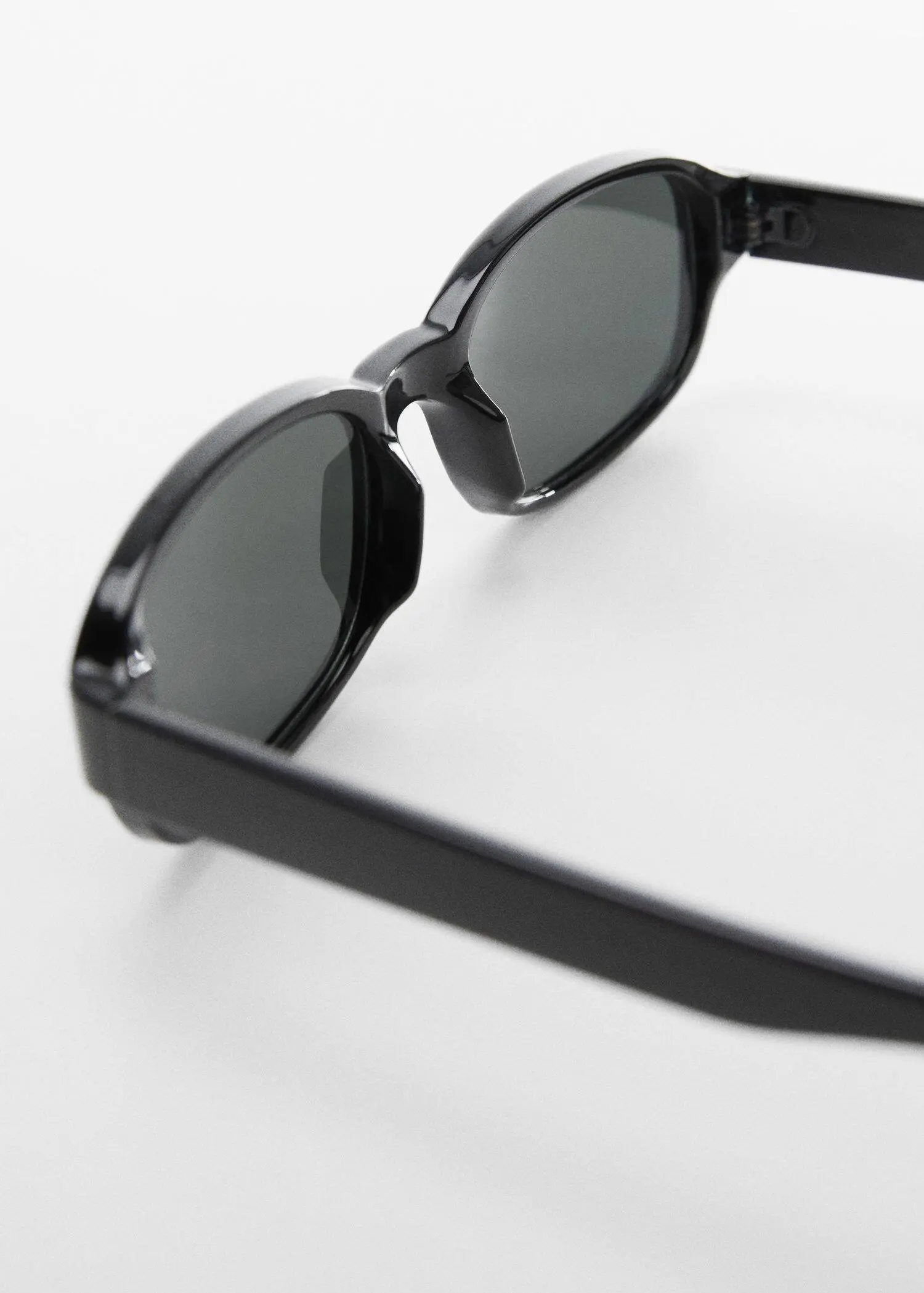Mango Retro style sunglasses. a close up of a pair of sunglasses 