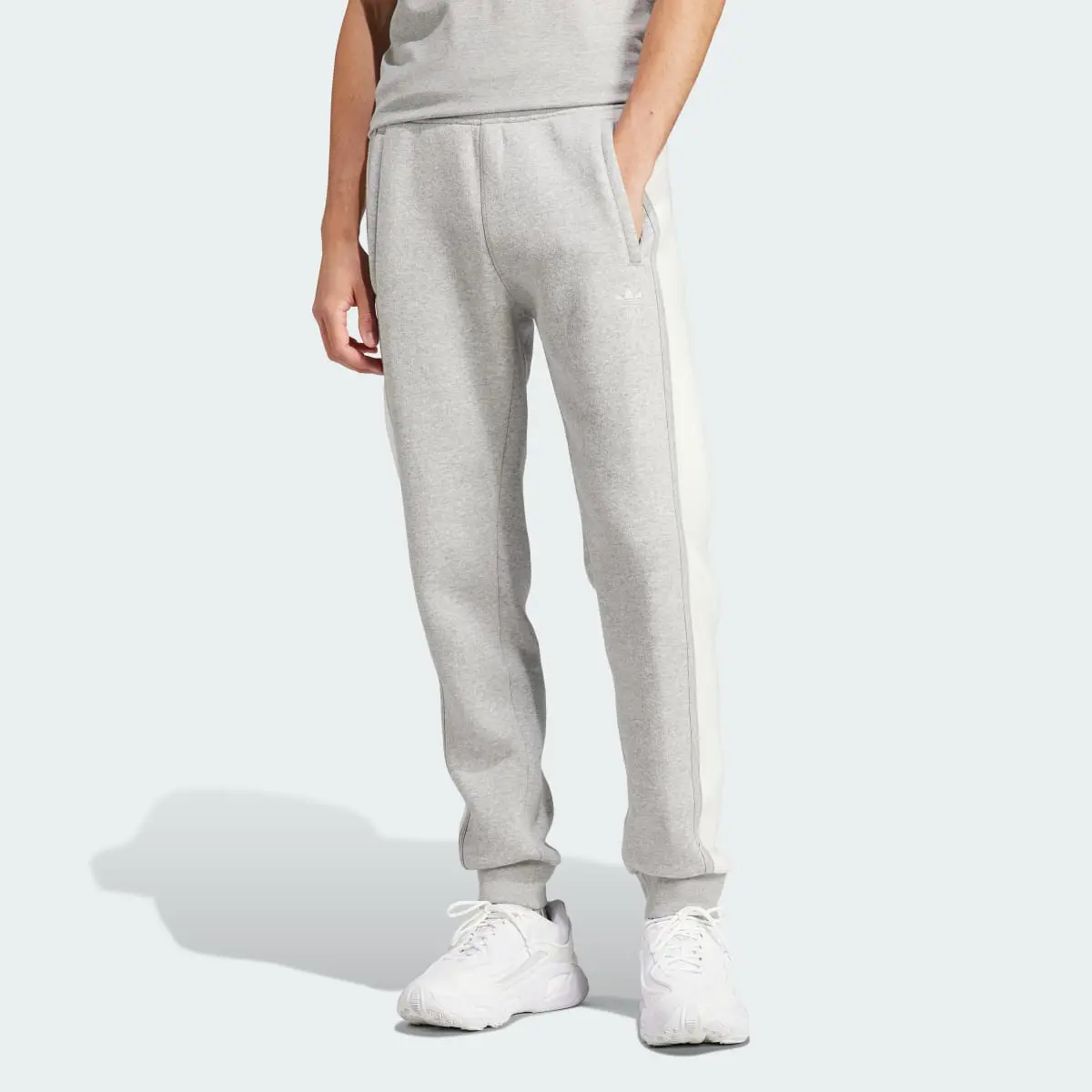 Adidas Trefoil Essentials+ Reverse Material Sweat Pants. 1