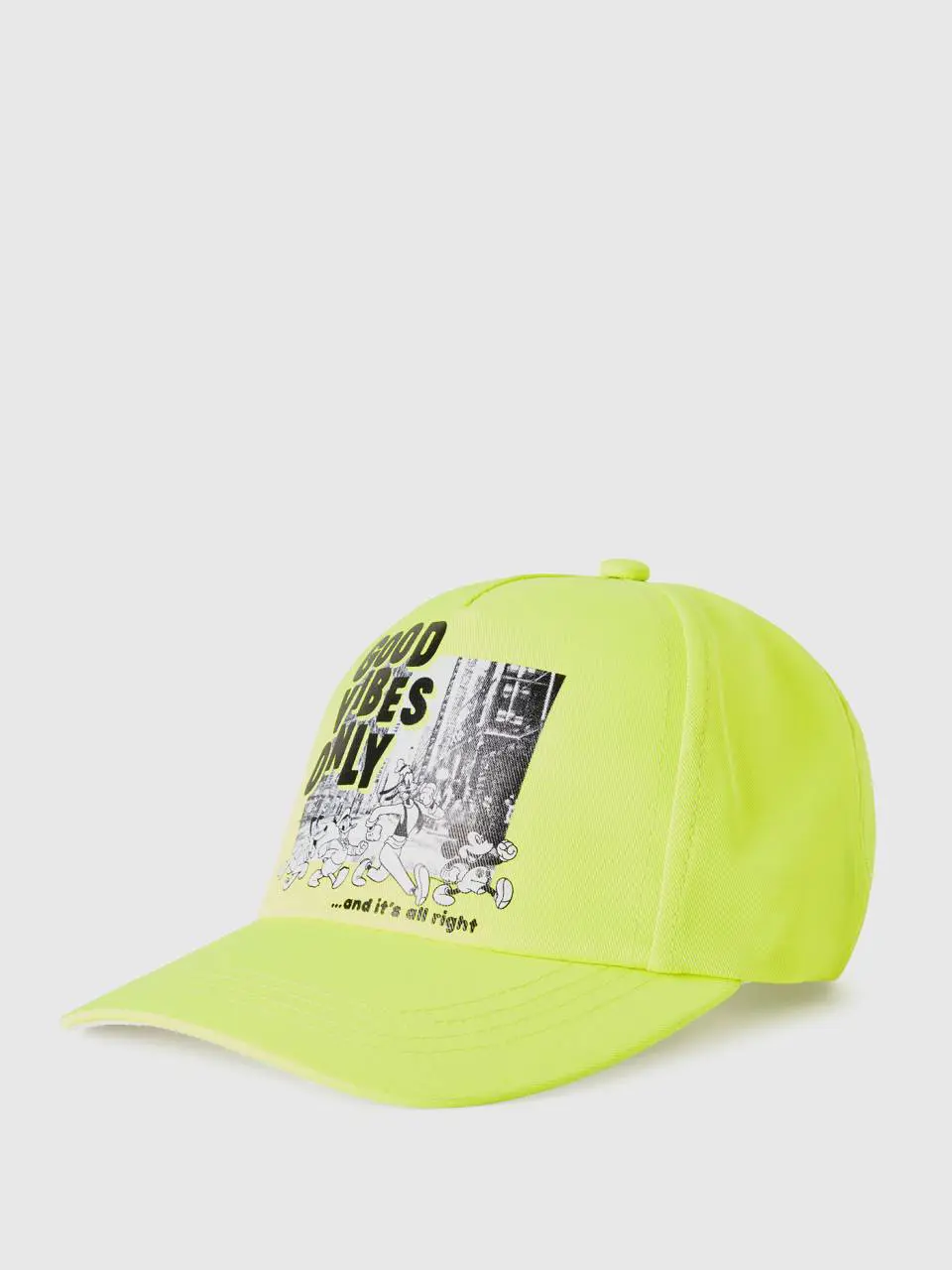 Benetton yellow baseball cap with disney print. 1