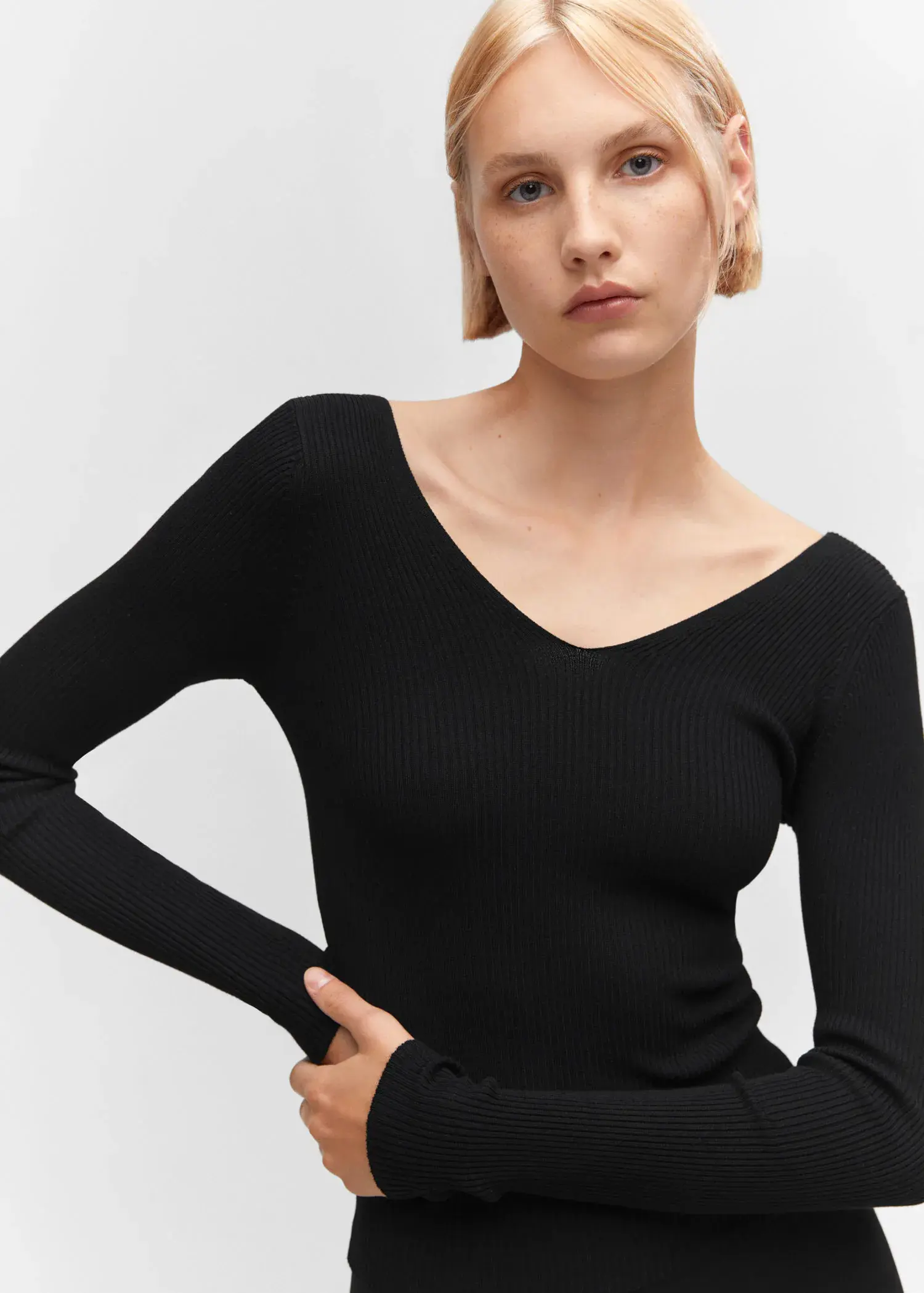Mango Ribbed sweater with low-cut back. 1