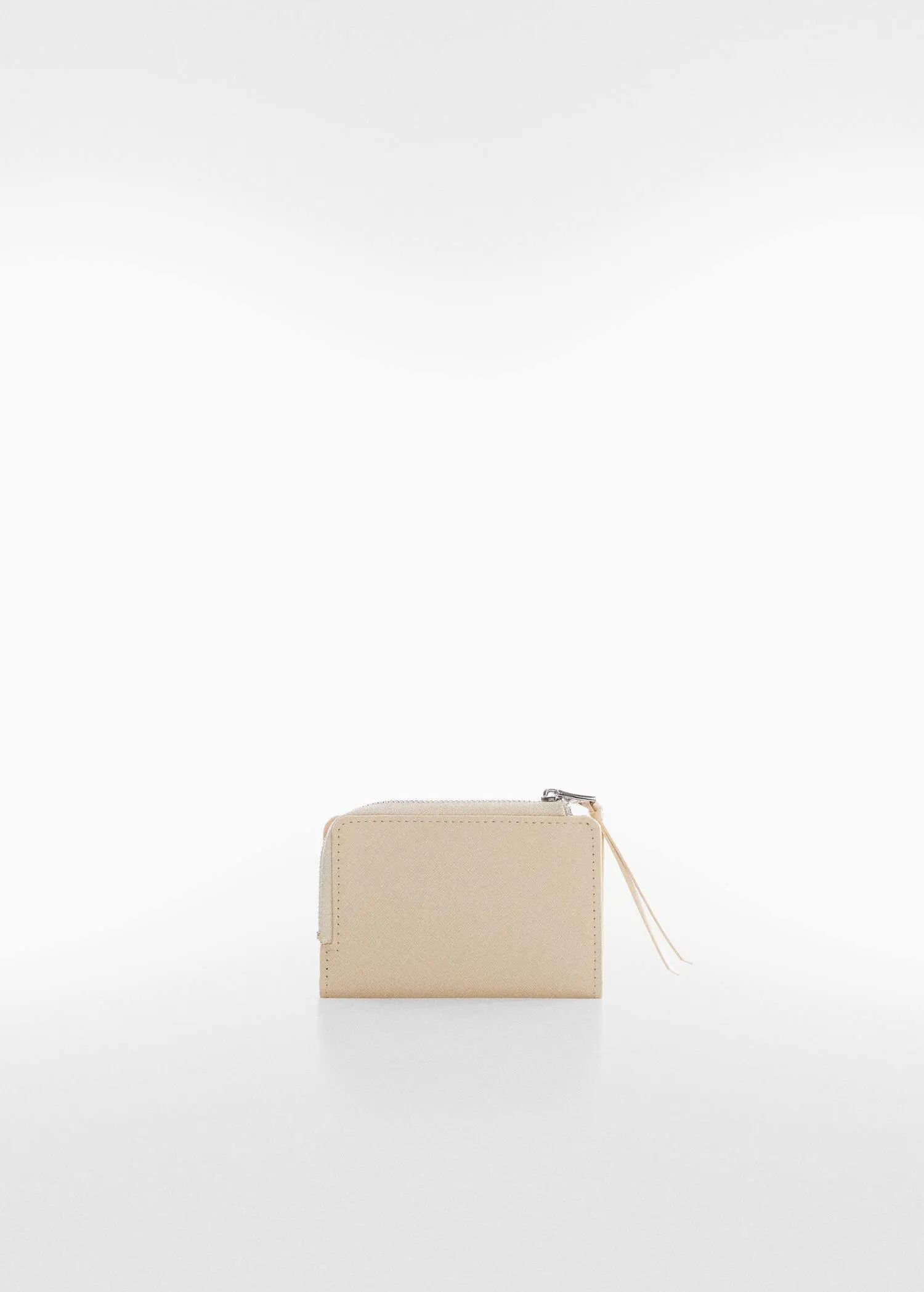 Mango Saffiano-effect wallet. a beige purse sitting on top of a white table. 