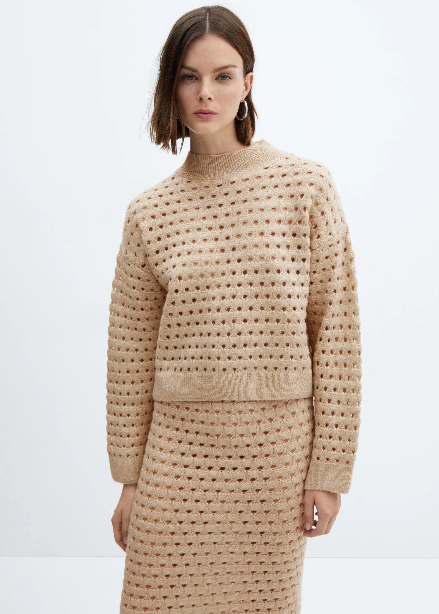 Mango Knitted sweater with openwork details. 1
