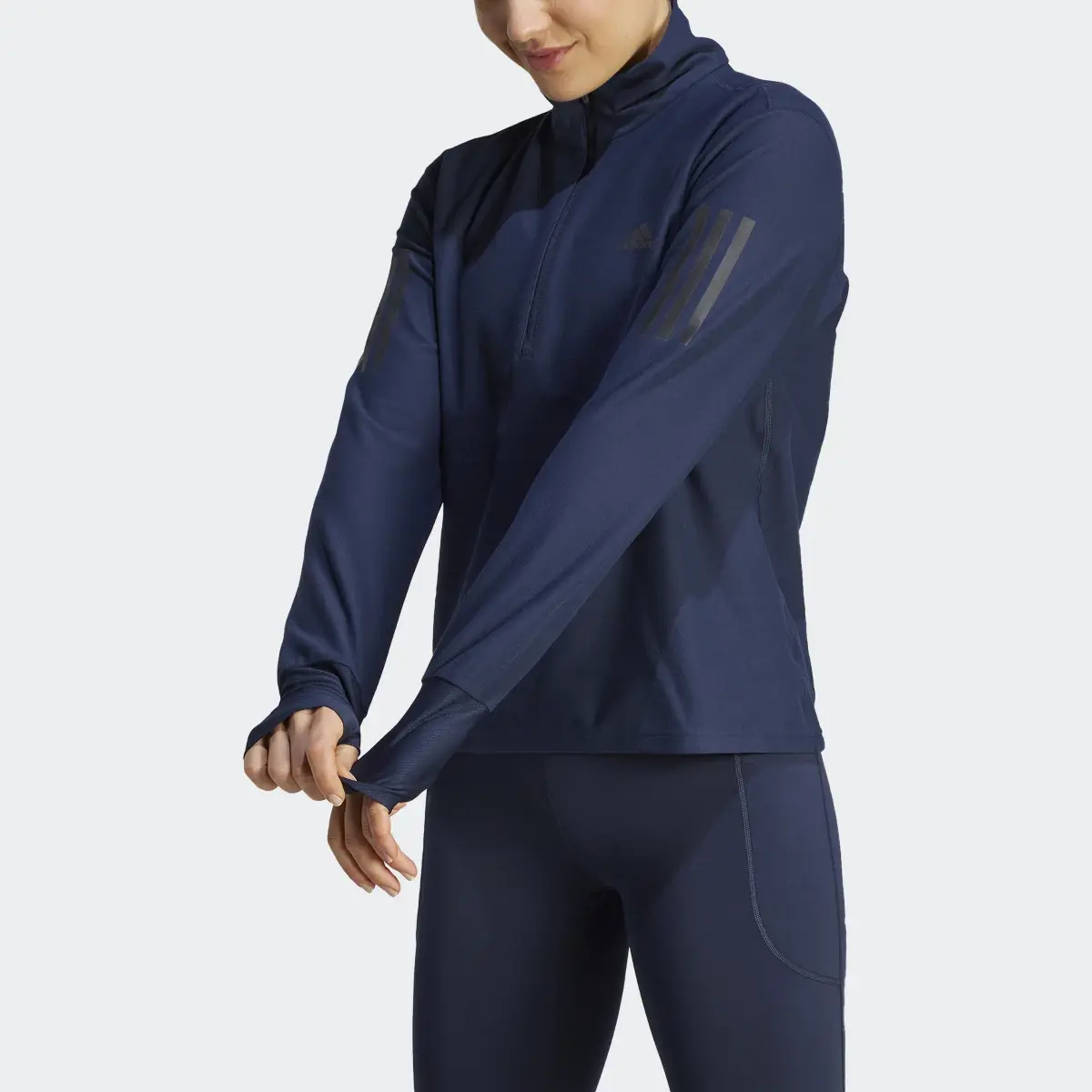 Adidas Own the Run Running 1/2 Zip Sweatshirt. 1