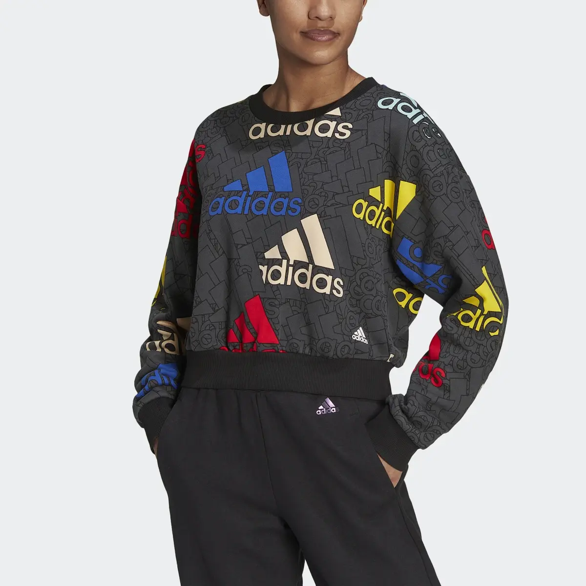 Adidas Essentials Multi-Colored Logo Crop Sweatshirt. 1