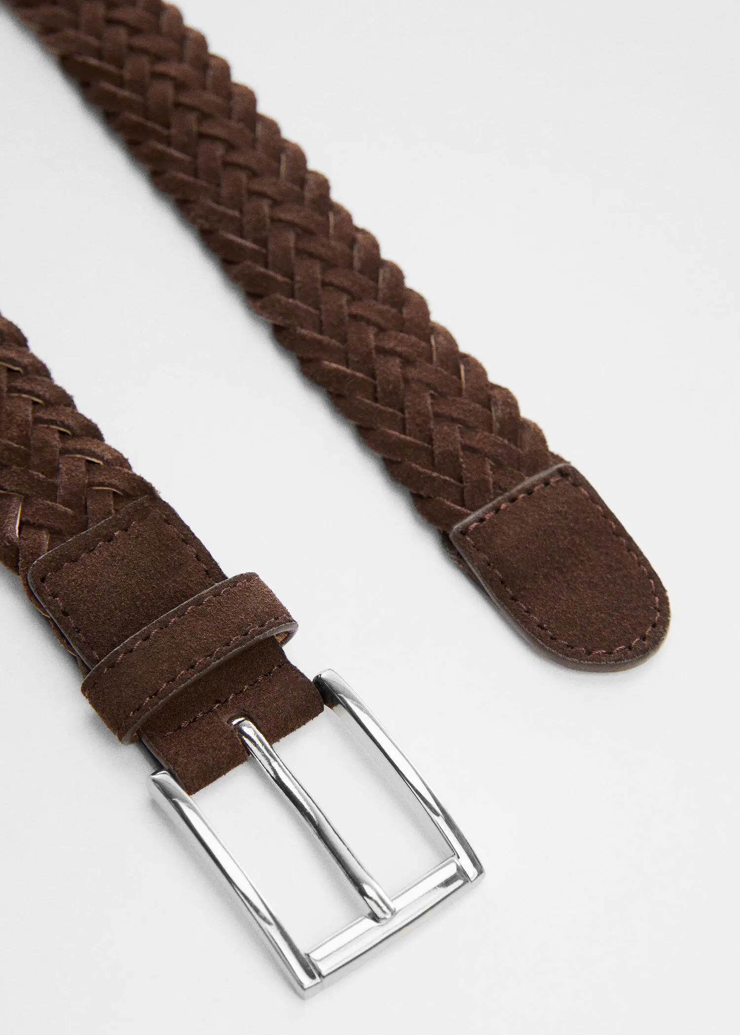 Mango Braided suede belt. a close-up of a brown belt on a table. 