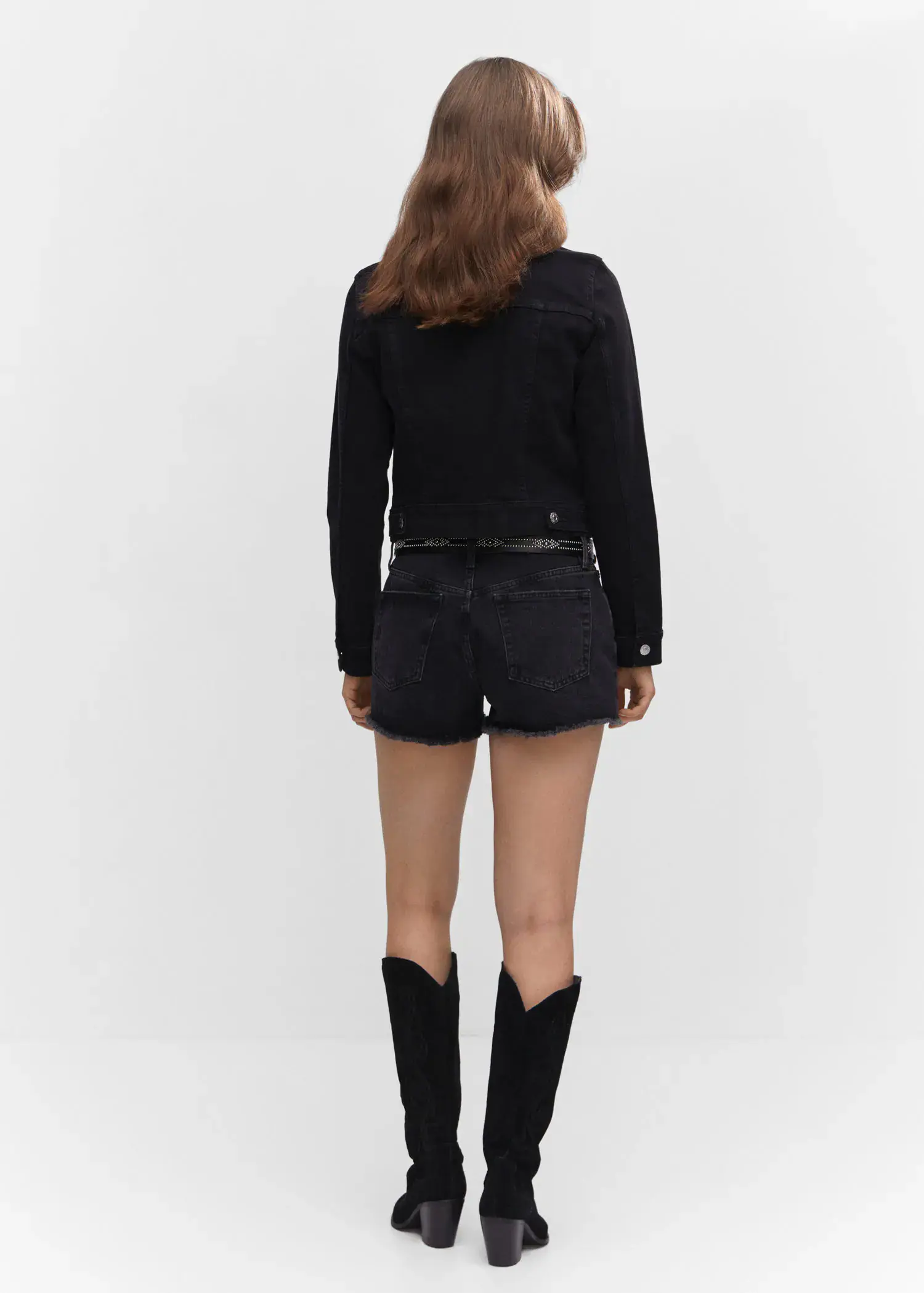 Mango Pocketed denim jacket. a woman wearing black shorts and boots. 
