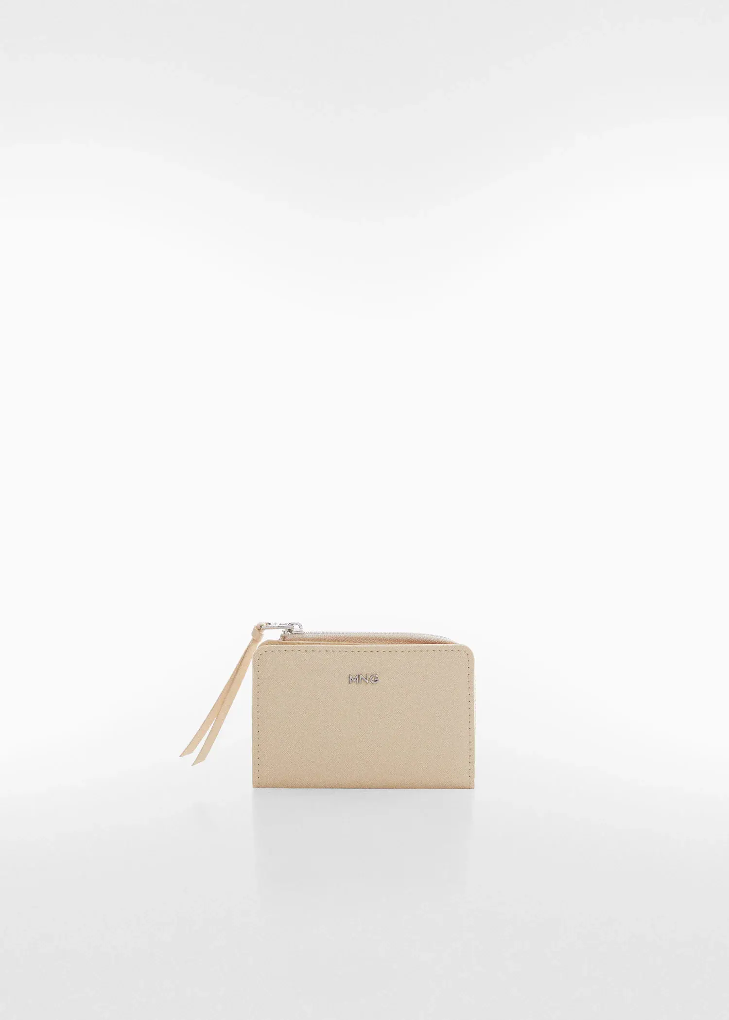 Mango Saffiano-effect wallet. a beige wallet sitting on top of a white table. 