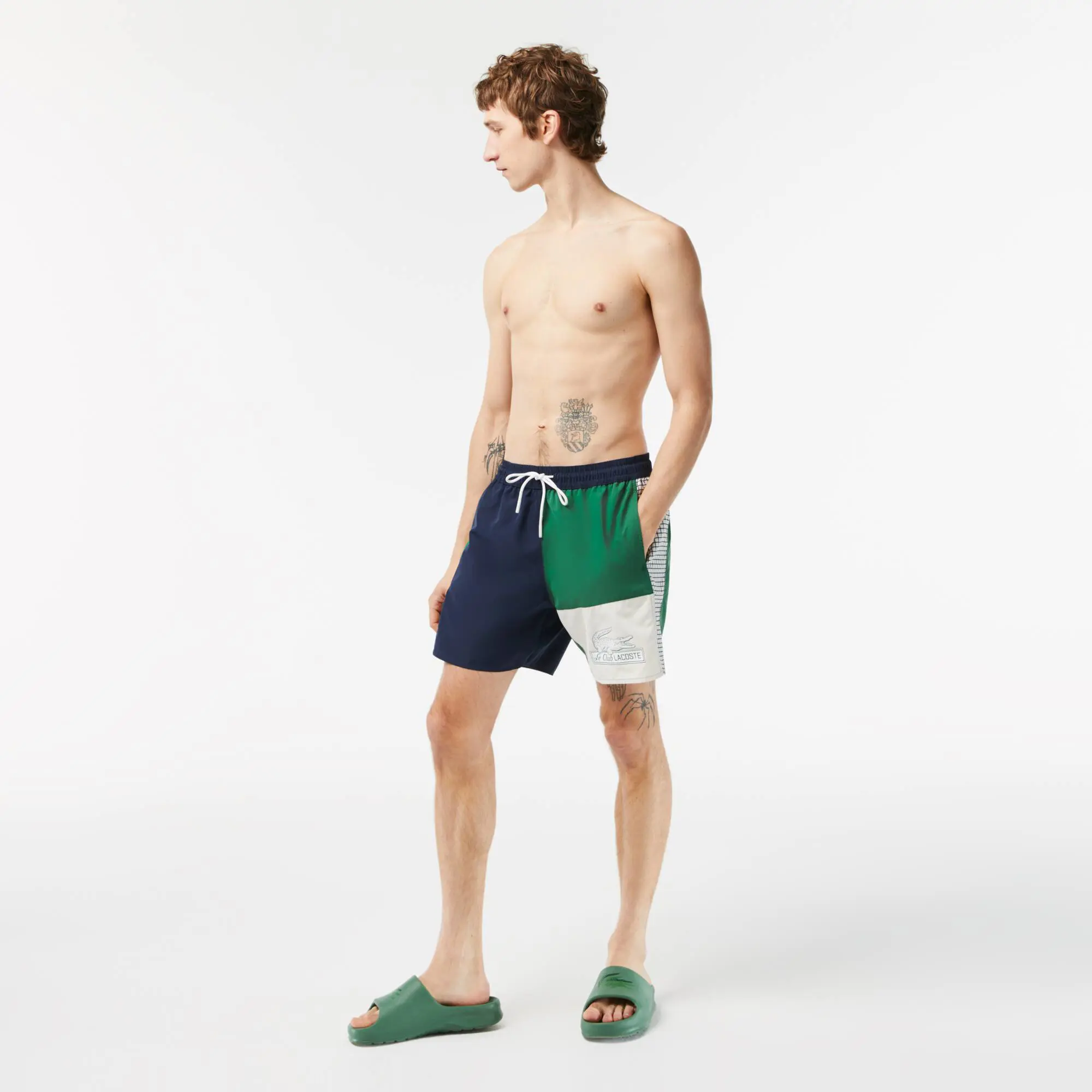 Lacoste Men’s Colorblock Swim Trunks. 1