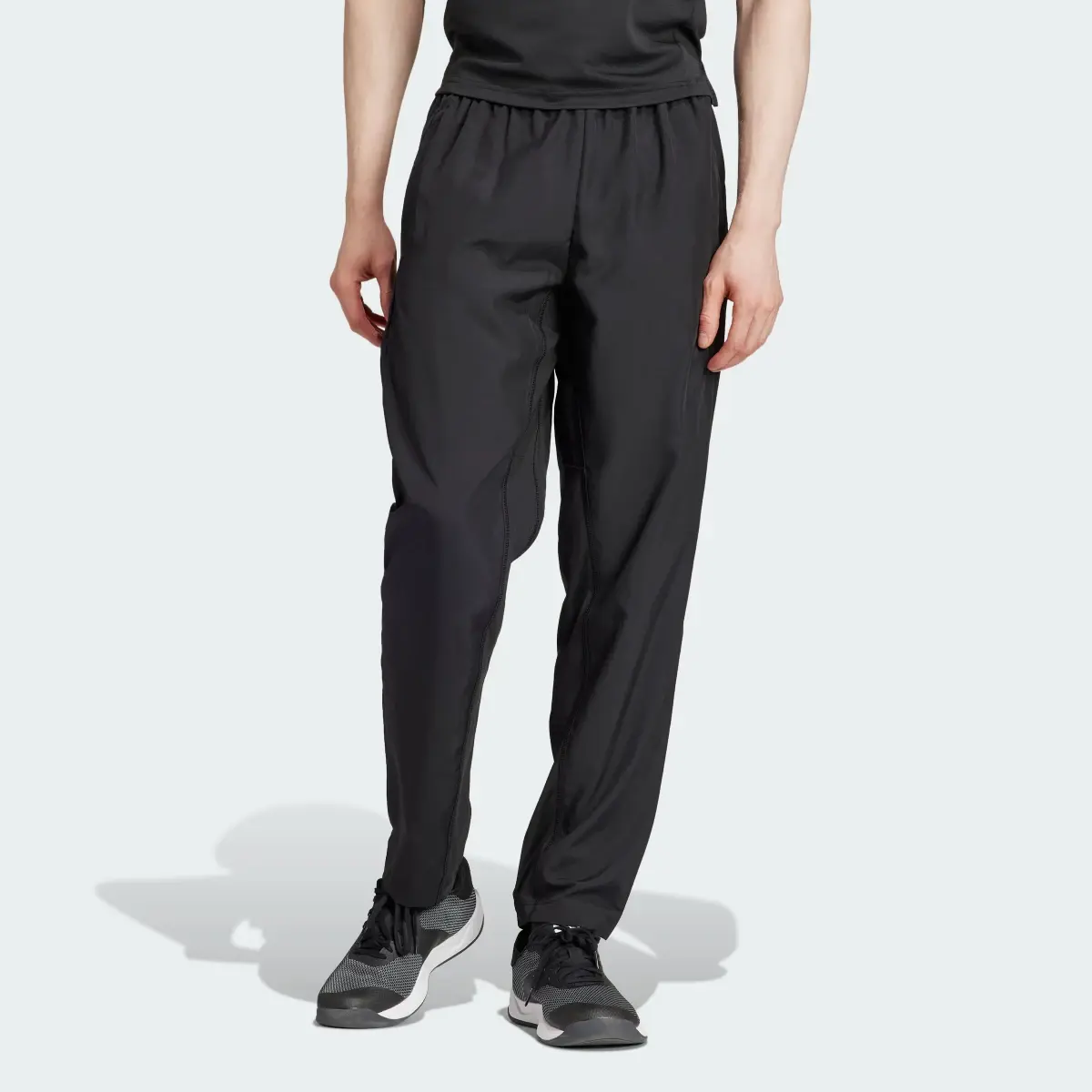 Adidas Train Essentials Seasonal Woven Training Pants. 1