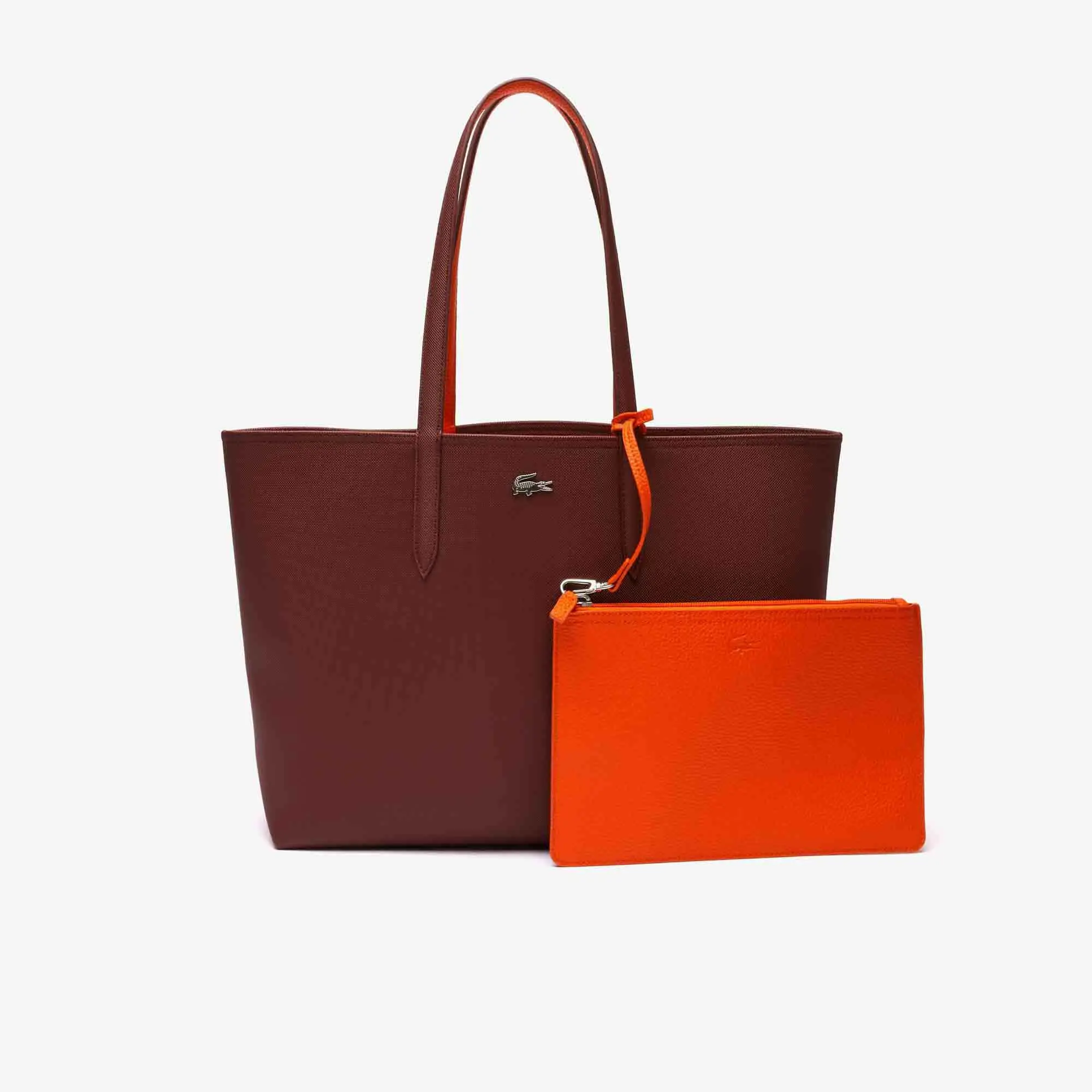 Lacoste Women's Anna Reversible Two-Tone Tote. 1 Lacoste Women's Anna Reversible Two-Tone Tote. 1