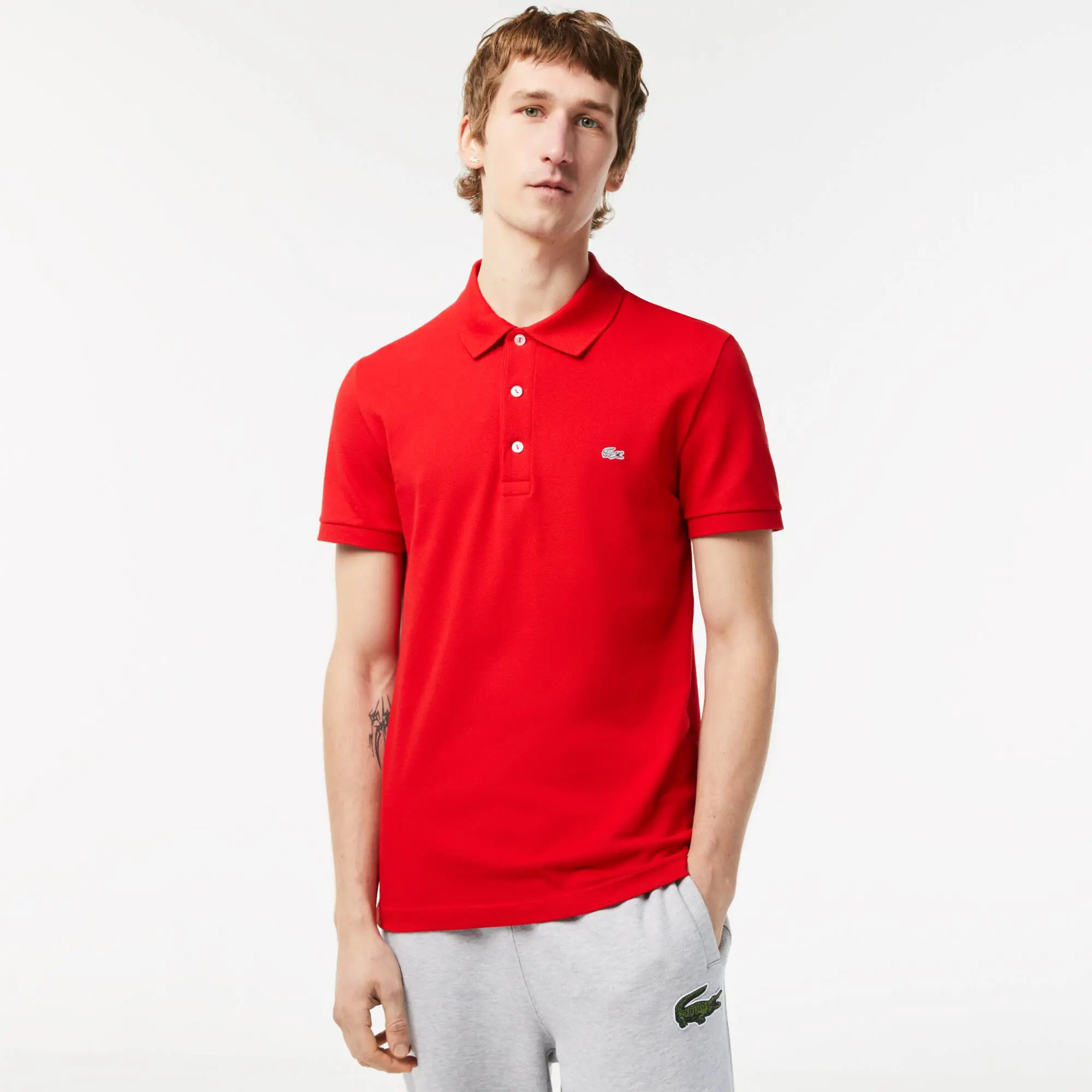 Lacoste Slim Fit Lacoste-Polo aus dehnbarem Petit Piqué. 1