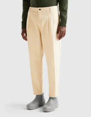 trousers in cotton with pleats
