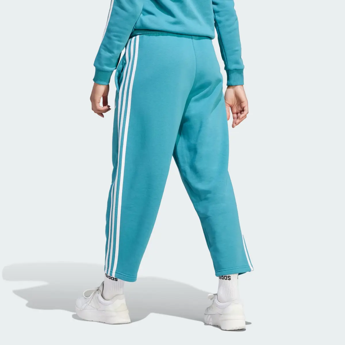 Adidas Essentials 3-Stripes Open Hem Fleece Pants. 2