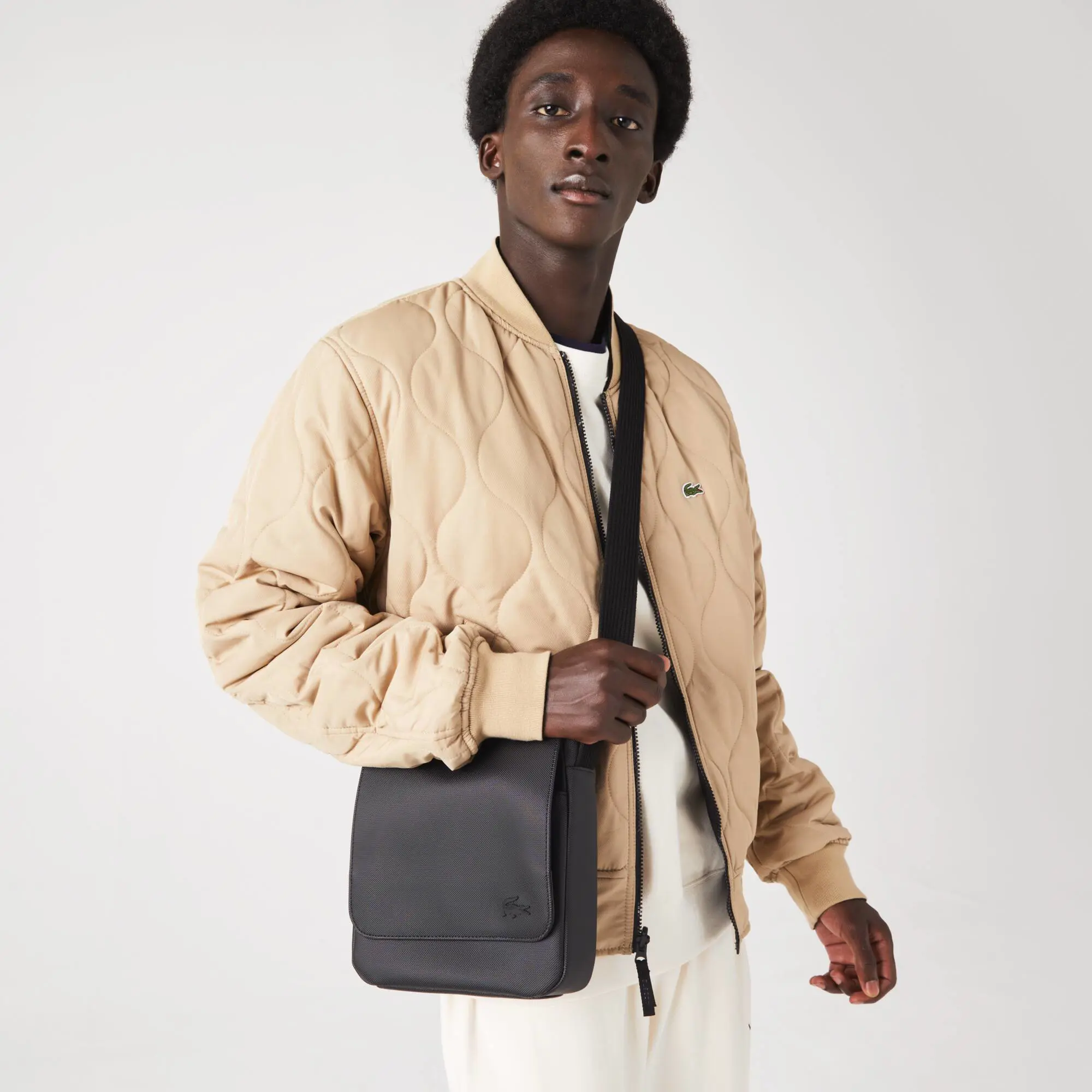 Lacoste Men's Classic Petit Piqué Flap Bag. 1