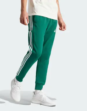 Adidas Essentials French Terry Tapered Cuff 3-Stripes Joggers. 3 Adidas Essentials French Terry Tapered Cuff 3-Stripes Joggers. 3