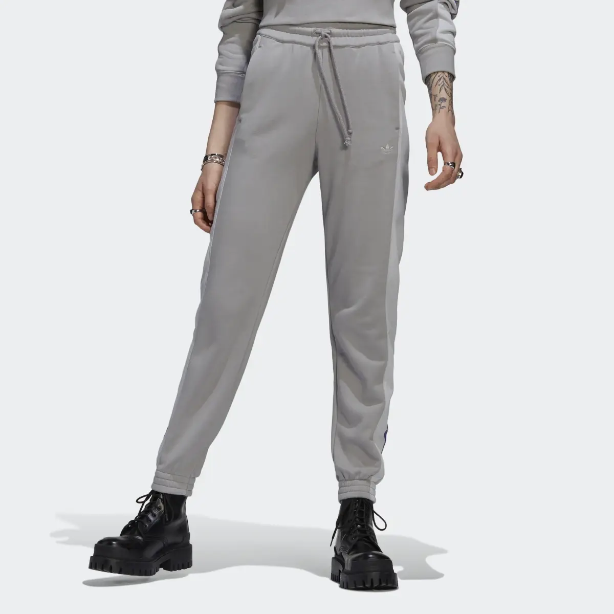 Adidas Blocked Graphic Cuffed Joggers. 1