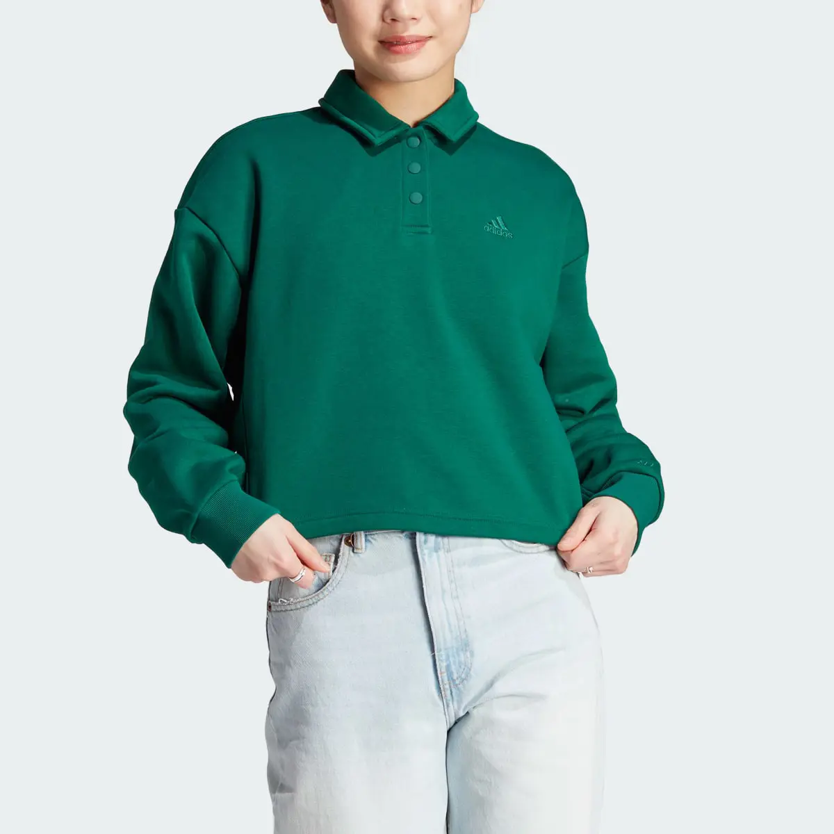Adidas All SZN Fleece Graphic Polo Sweatshirt. 1