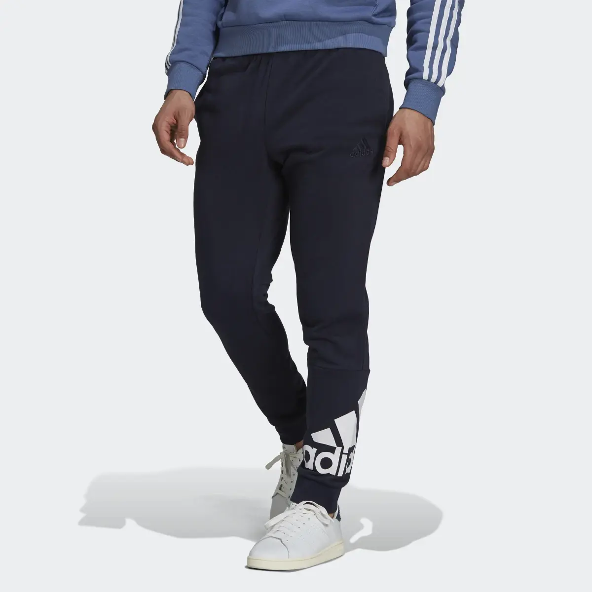 Adidas Pantaloni Essentials French Terry Tapered Cuff Logo. 1