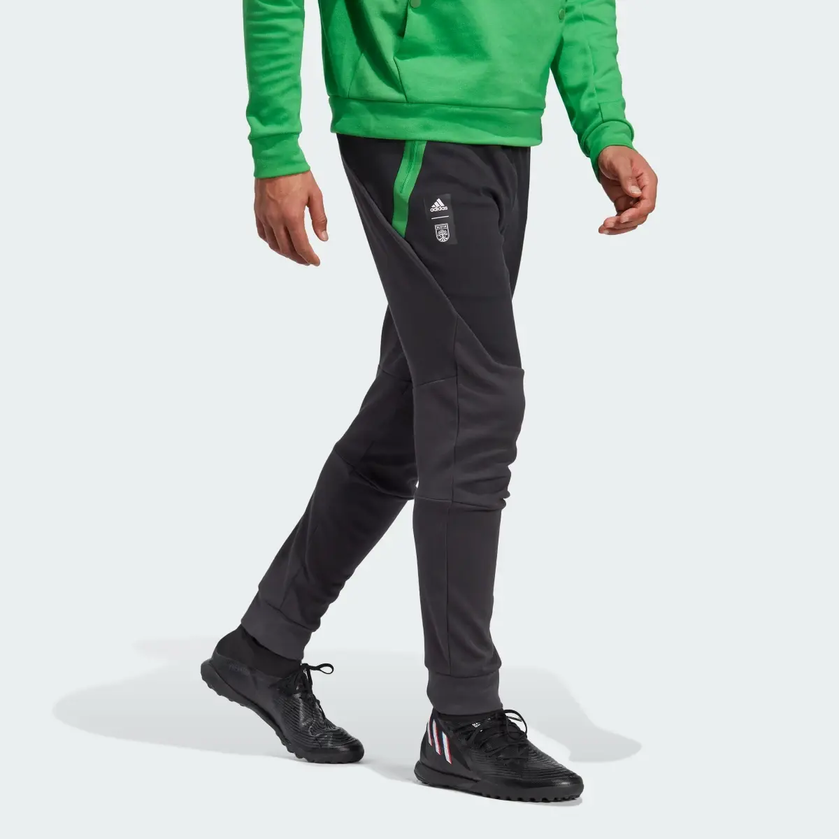 Adidas Austin FC Travel Pants. 1