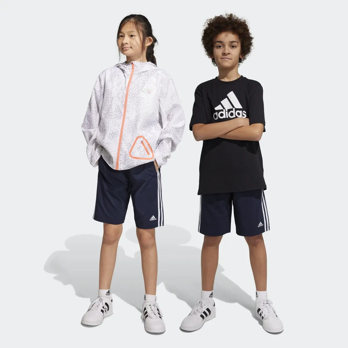 Adidas Essentials 3-Stripes Woven Shorts. 1