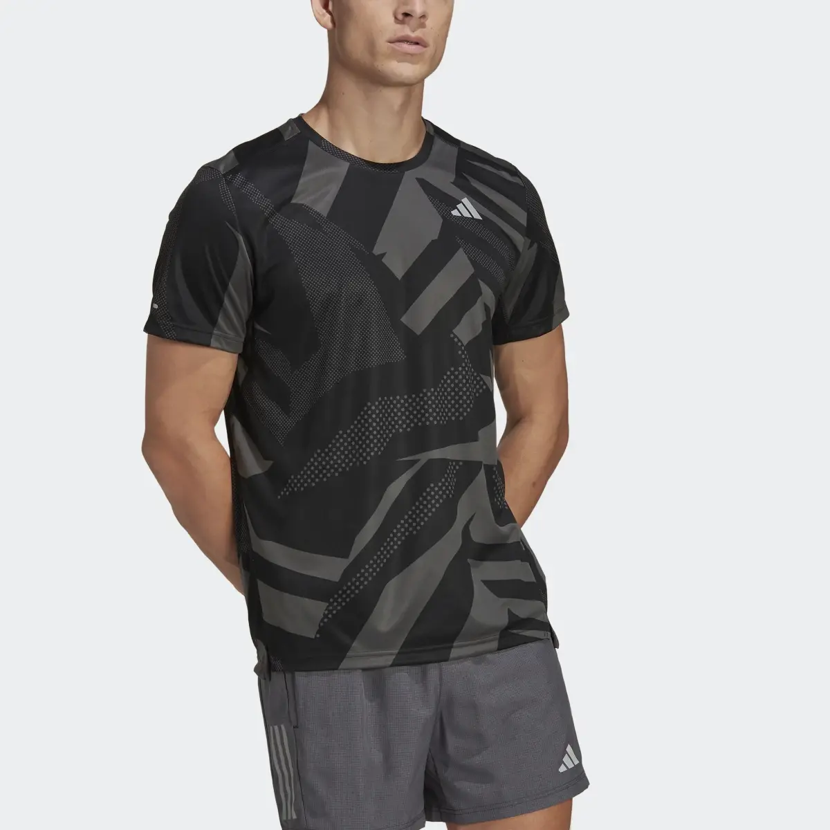 Adidas Playera Own the Run Seasonal. 1