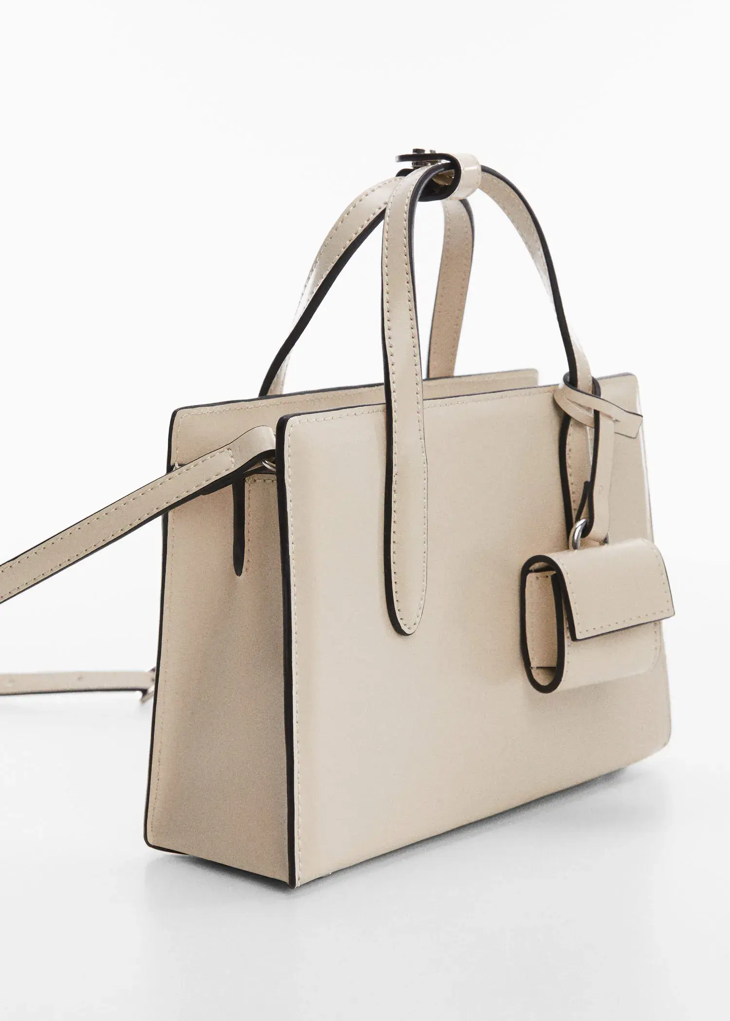 Mango Saffiano-effect small shopper bag. a close-up of the side of a white purse. 