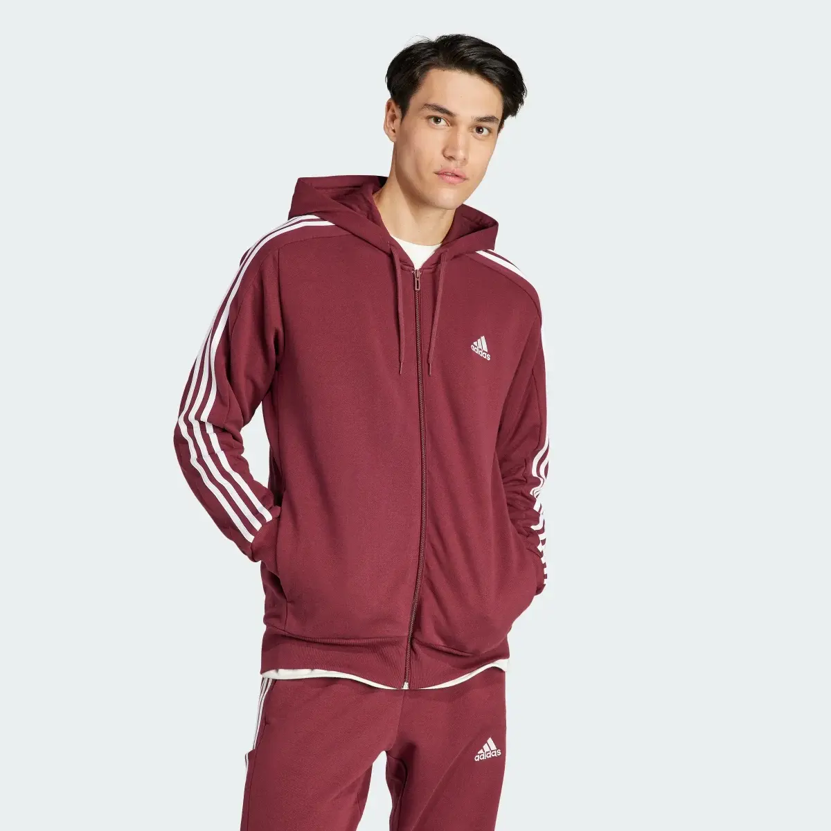 Adidas Chaqueta con capucha Essentials French Terry 3 bandas. 2