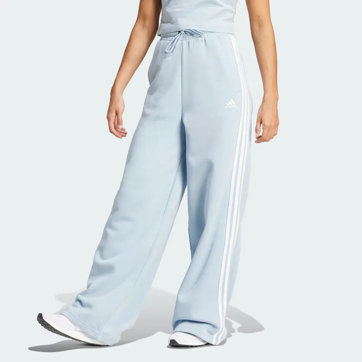 Adidas Essentials 3-Stripes Fleece Wide Pants. 1