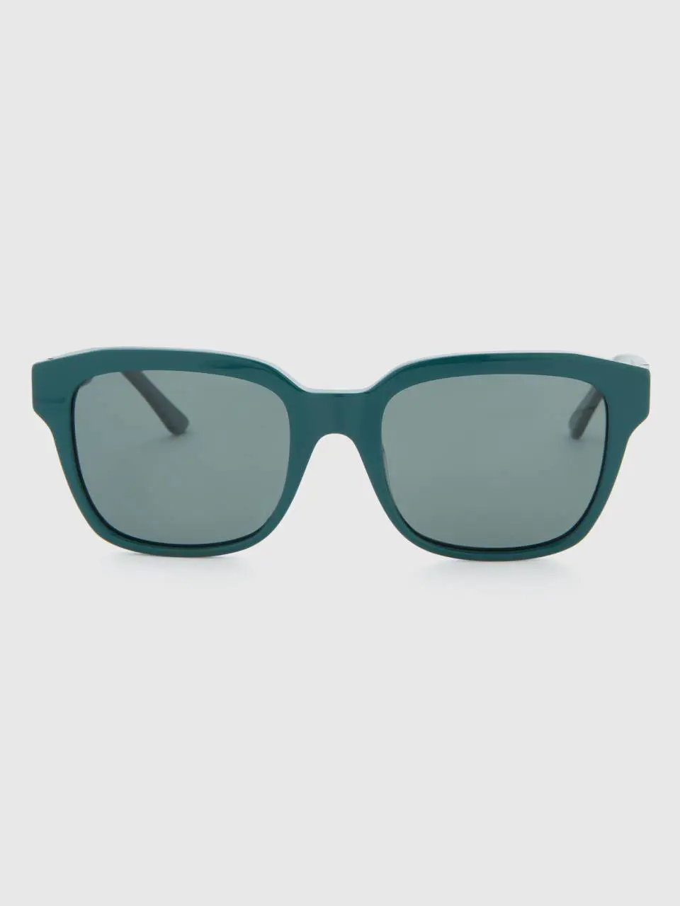 Benetton green sunglasses with logo. 1