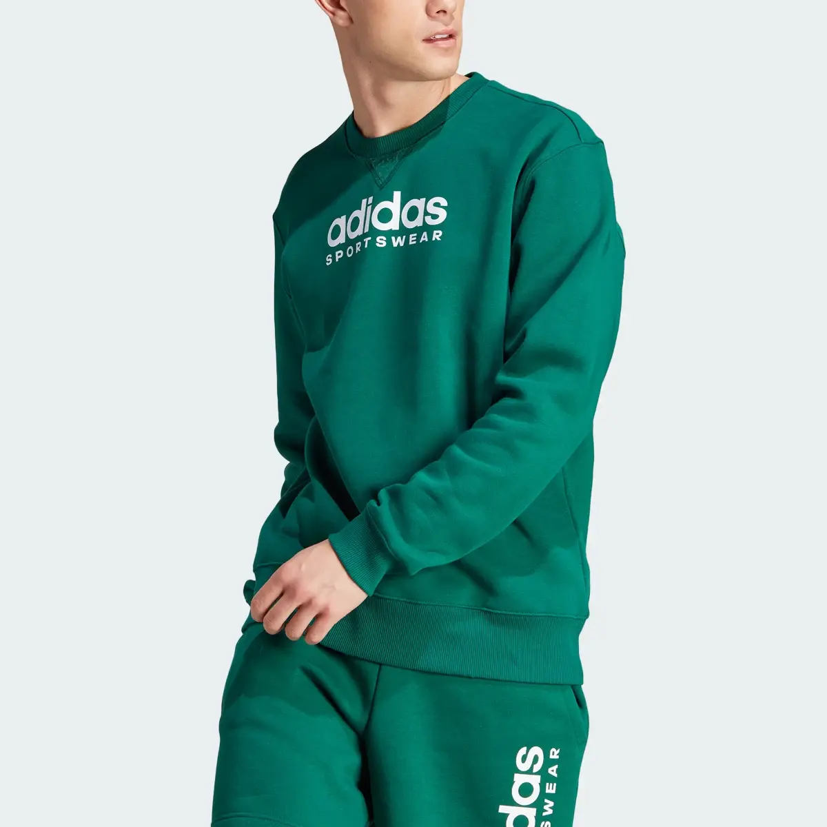 Adidas All SZN Fleece Graphic Sweatshirt. 1